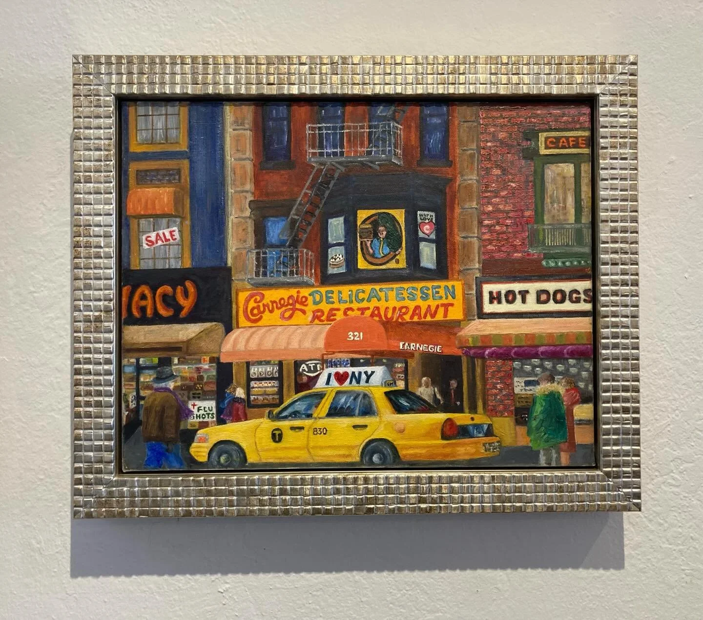 Here we have a shallow floater frame placed inside a traditional frame.  This gives us the opportunity to create a floater frame out of a traditional frame.  We painted the black floater frame to match the finish of the patterned frame so it became o