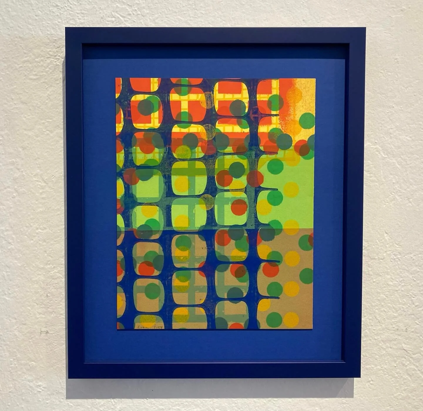 Sometimes all you need is a simple frame and mat to make the art shine.  Here we have the art floating on a blue mat so that none of the edges are covered and the a blue frame to keep the focus on the strong color in the piece.
#framecraftersgallery 