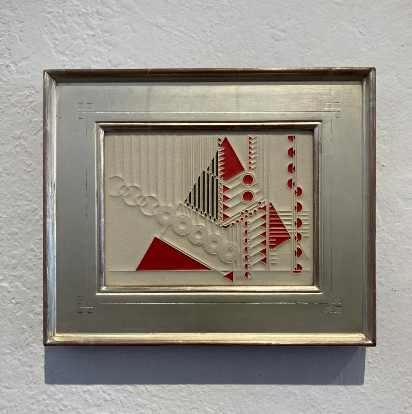 What do you do with beautiful tiles &hellip; frame them!  This is a Frank Lloyd Wright tile of a Christmas tree.  We wanted something that would feel like the holidays and also had some unique style.  This white gold frame, made by Rhonda Feinman, ha