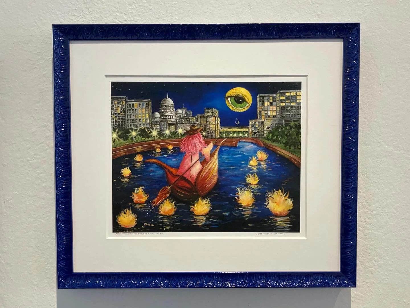 Color and pattern can make a big impact in your custom framing design choices.  A simple black frame is frequently a go-to because it is so familiar, however with a few adjustments you can really change how a piece looks.  On this lithograph we went 