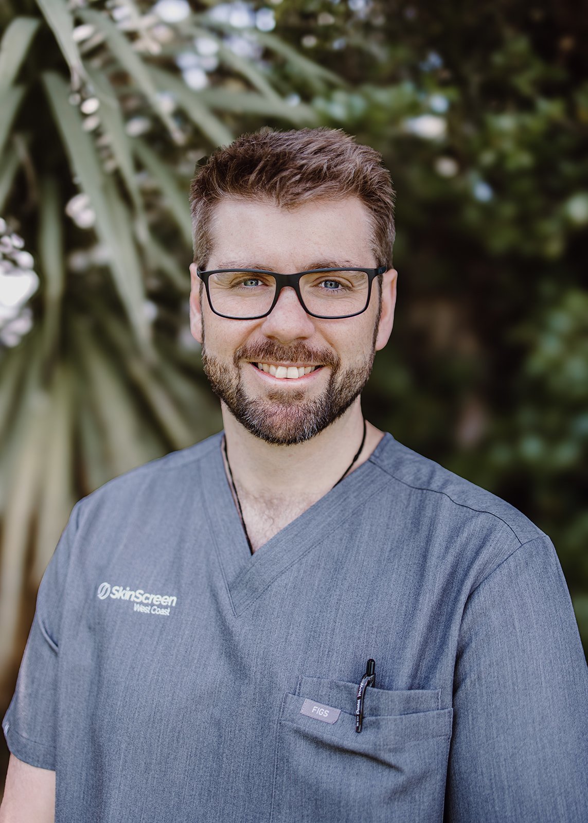 Dr Calum Stannett wearing SkinScreen uniform