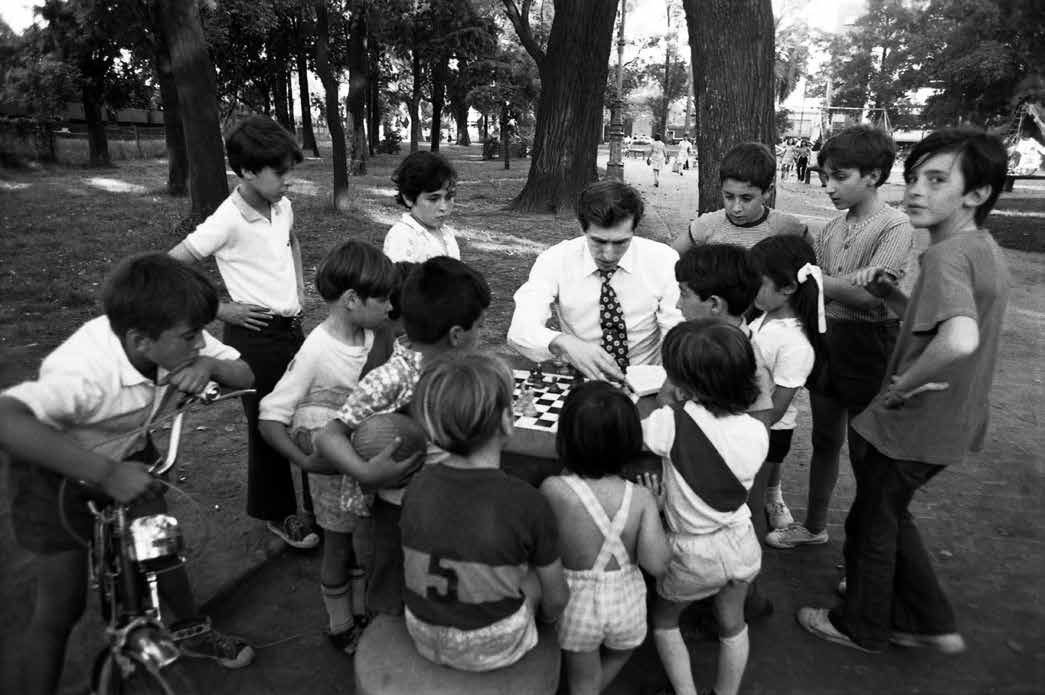 Harry Benson, Bobby Fischer, Chess in the Park, Children Gather Round, 1971, Archival Pigment Photograph