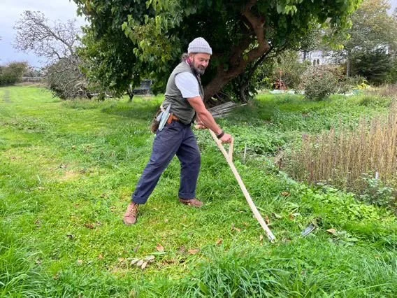 danny parrack, gardener, sithing a lawn as a natural care technique