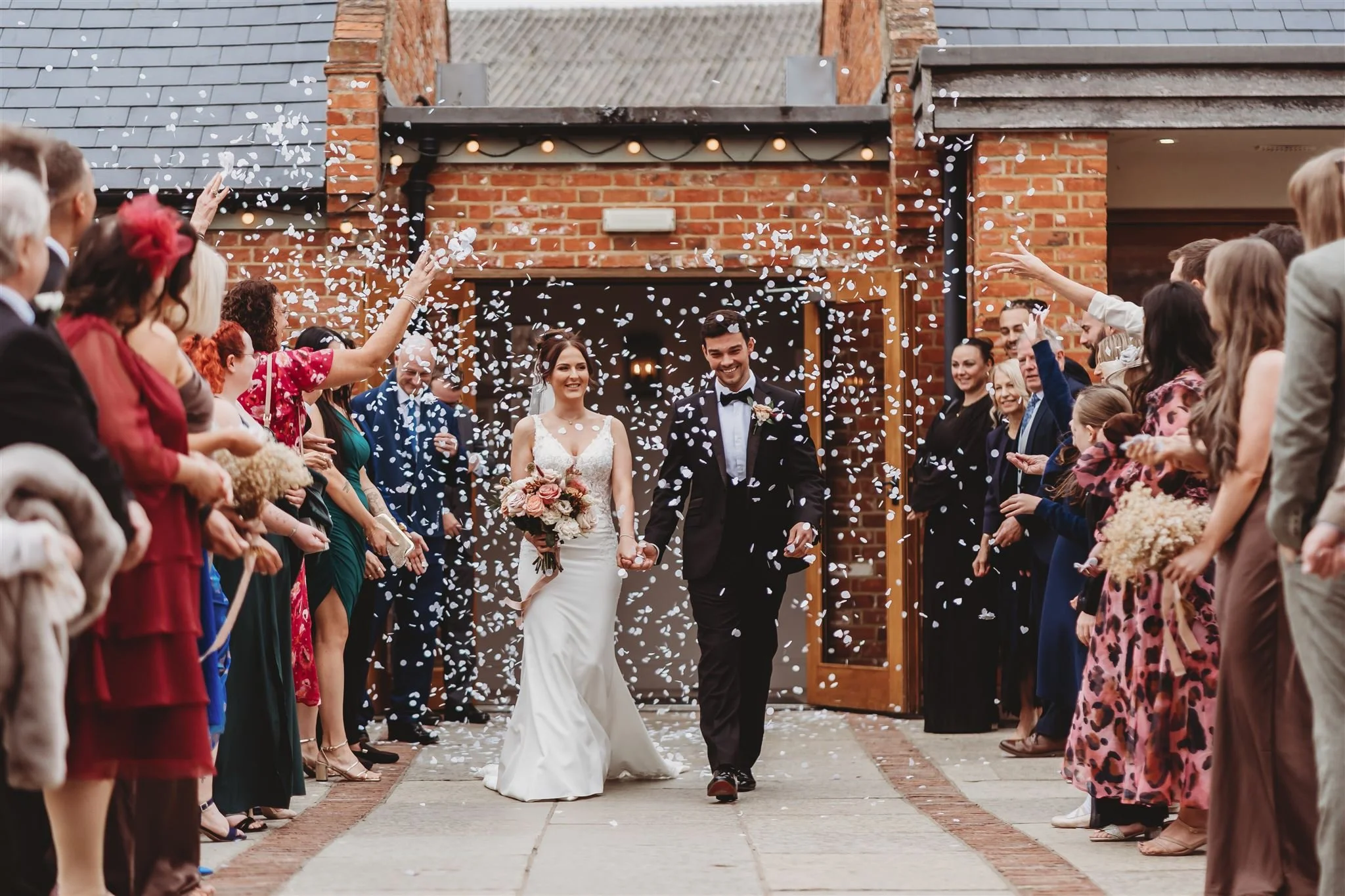 Kymbly & Nicholas Oct Matt Wing confetti courtyard.jpg