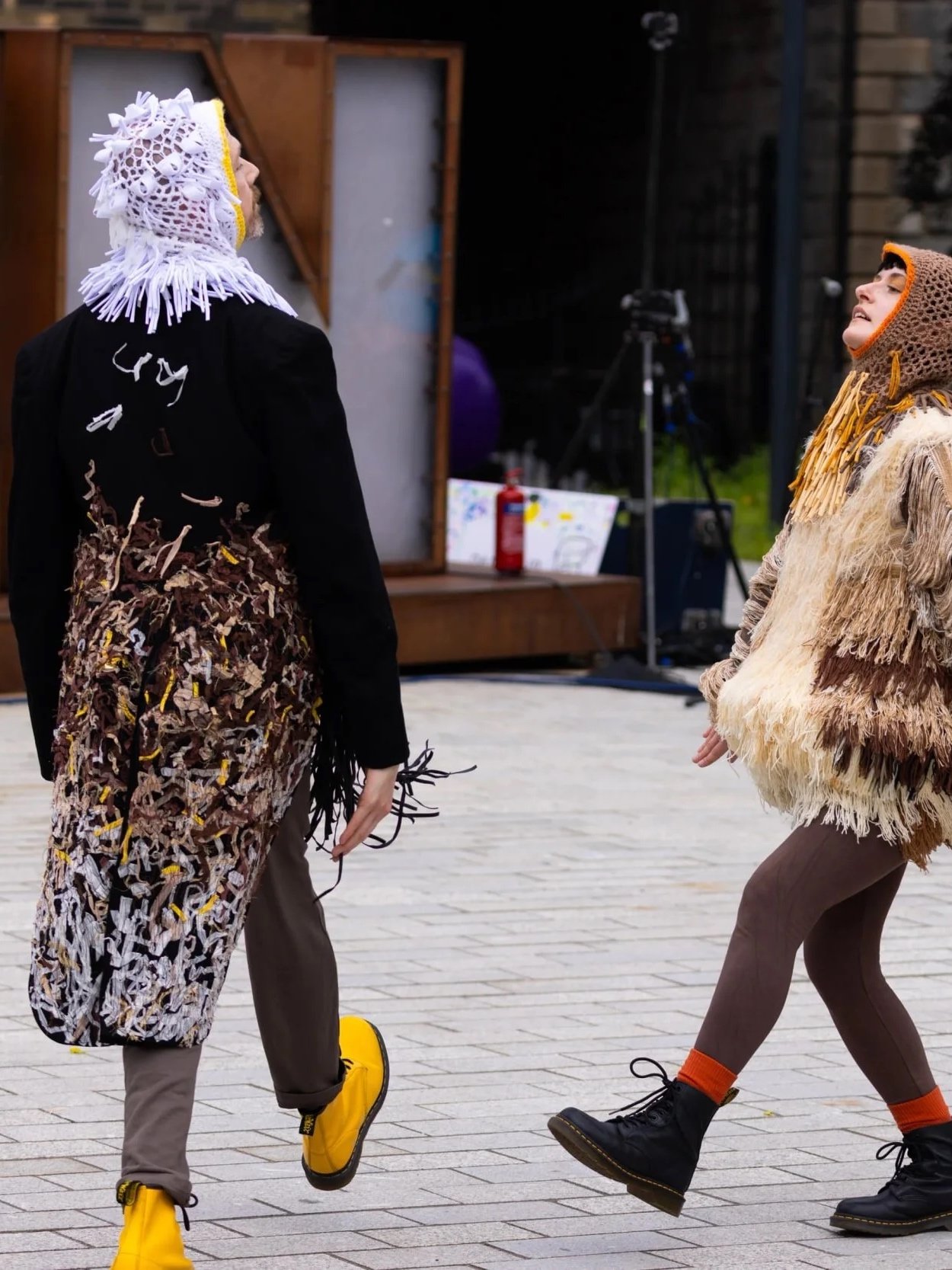 2 dancers representing birds.