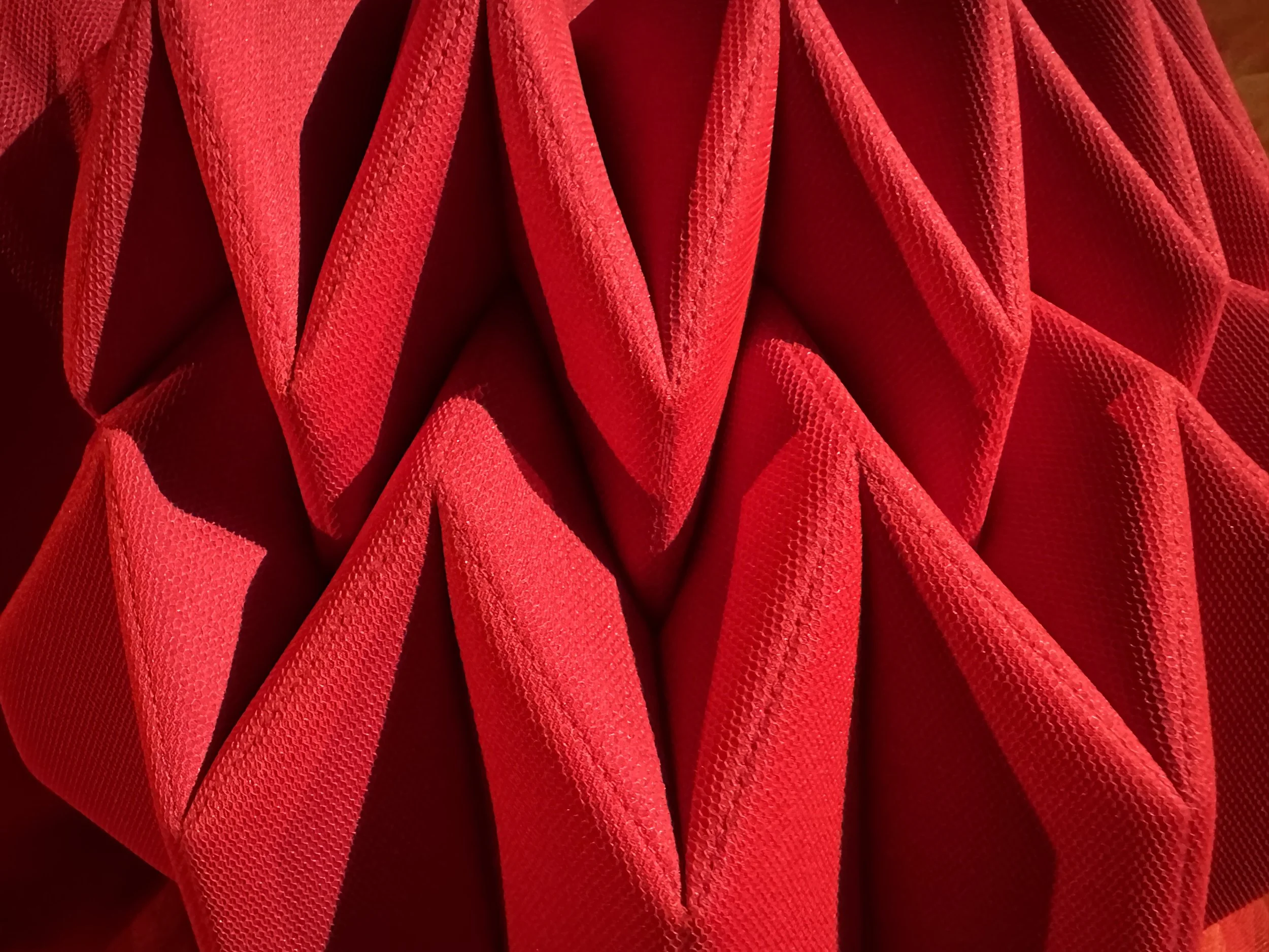 Red origami section of dress