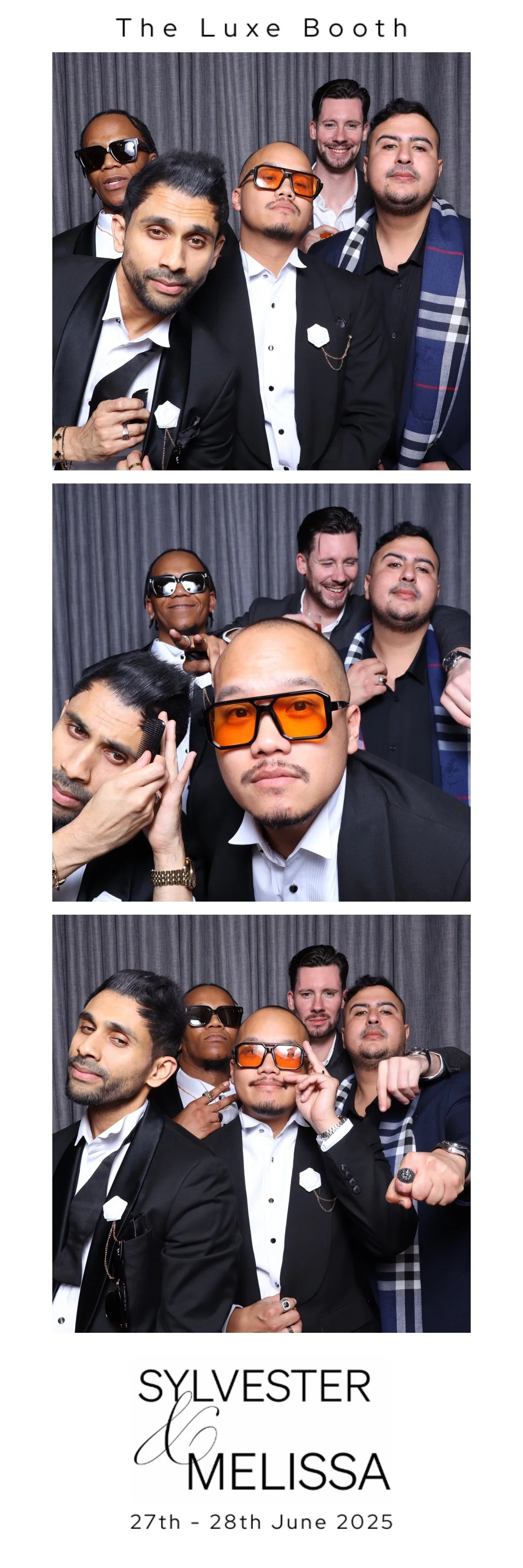 Group of five men in a photo booth at a wedding celebration, with four wearing sunglasses. The backdrop is grey curtains. Text at the top reads 'The Luxe Booth' and at the bottom 'SYLVESTER & MELISSA 27th - 28th June 2025'.