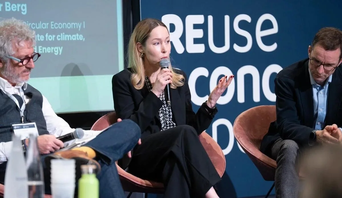 Marion Rouzeaud speaking at the CIRPASS-2 roundtable at REuse Economy Expo 2026 with Carolynn Bernier, Anne-Christine Ayed, Steffen Schwalm, Marion Rouzeaud, Xavier Lantoinette, and Holger Berg, presenting her new book titled DiPPa: Rethinking the Wa