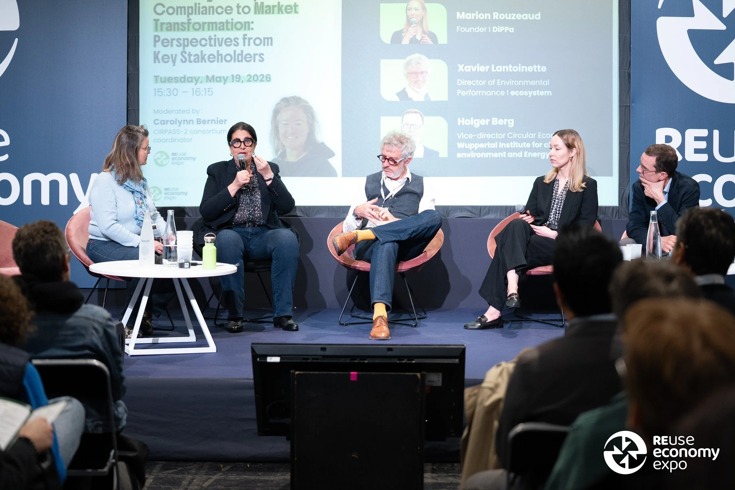 Marion Rouzeaud speaking at the CIRPASS-2 roundtable at REuse Economy Expo 2026 with Carolynn Bernier, Anne-Christine Ayed, Steffen Schwalm, Marion Rouzeaud, Xavier Lantoinette, and Holger Berg, presenting her new book titled DiPPa: Rethinking the Wa