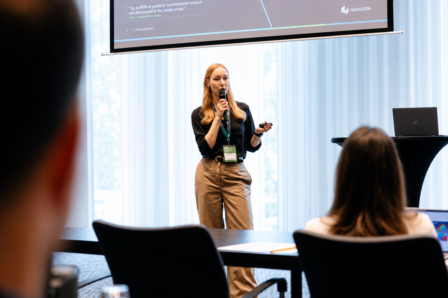 Marion Rouzeaud giving a presentation at a conference, introducing DiPPa: Rethinking the Way We Buy Things with Digital Product Passports, a pioneering book on Digital Product Passports (DPP), combining expert perspectives and industry insights