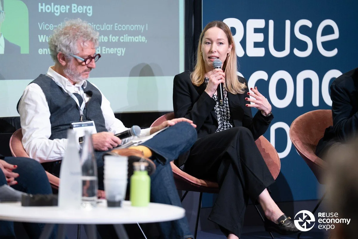 Marion Rouzeaud speaking at the CIRPASS-2 roundtable at REuse Economy Expo 2026 with Carolynn Bernier, Anne-Christine Ayed, Steffen Schwalm, Marion Rouzeaud, Xavier Lantoinette, and Holger Berg, presenting her new book titled DiPPa: Rethinking the Wa
