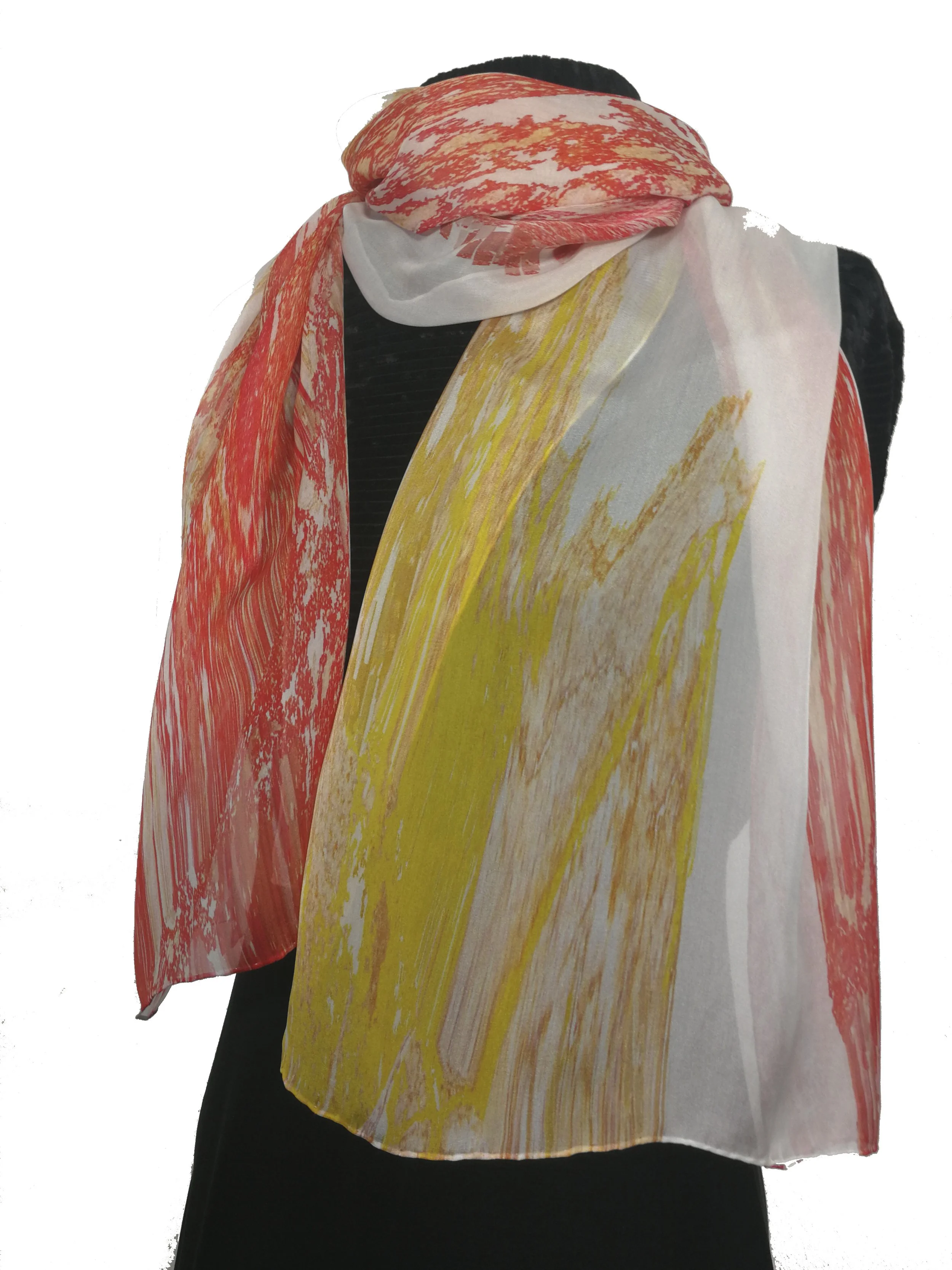 Colorful abstract patterned scarf draped over a black garment against a white background.