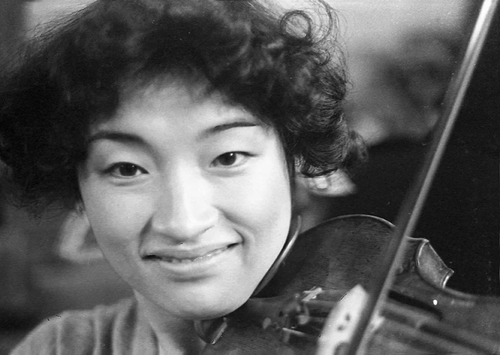 Kyung-Wha Chung, violinist sometime in 1970's. I think Kyung-Wha gave her first performance of the Elgar Violin Concerto with me and the Brighton Philharmonic Orchestra (of which I was Musical Director from 1974 to1987). We bonded well, and I remembe