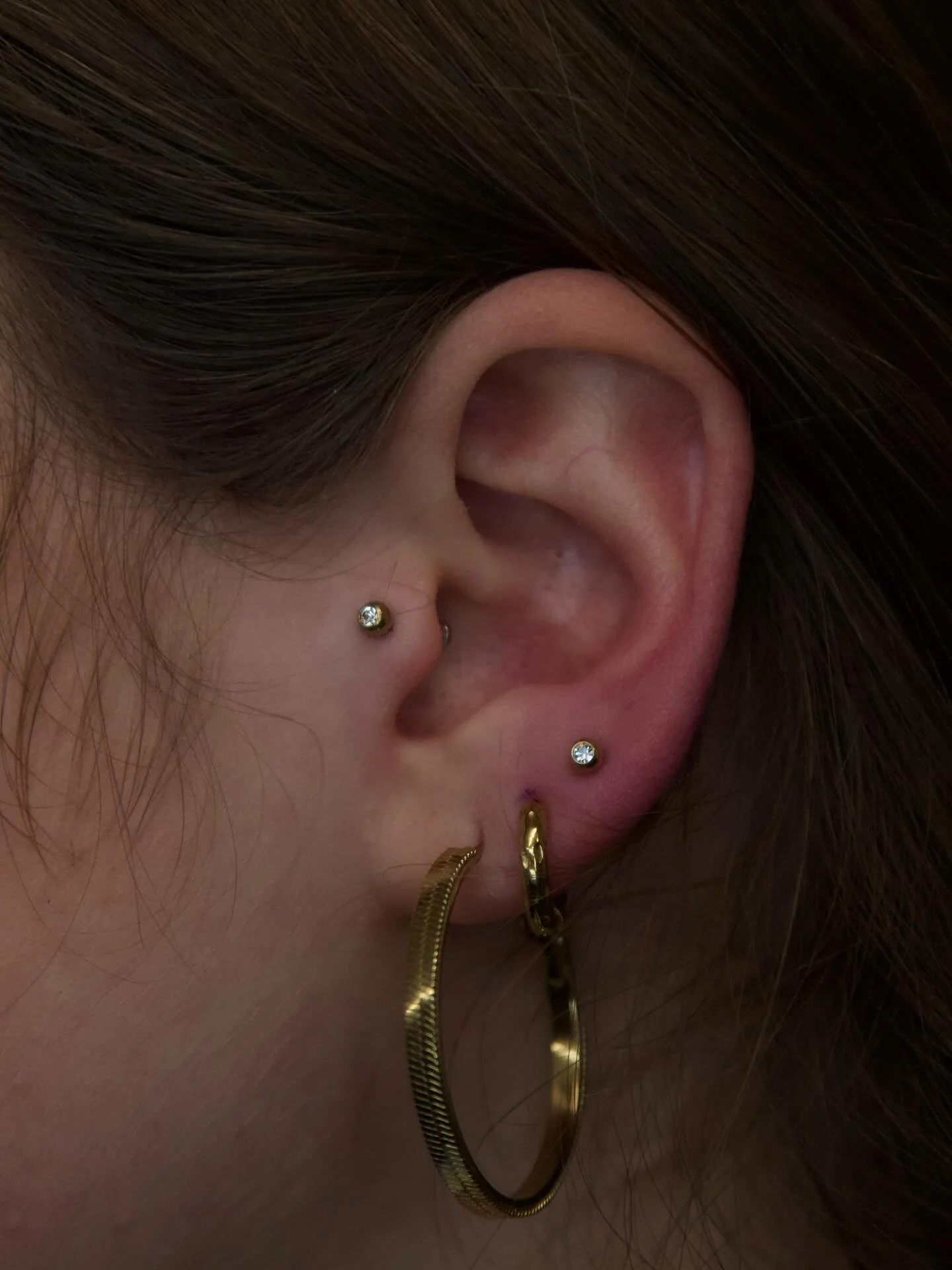 Tragus &amp; third lobe piercing for Dave&rsquo;s lovely client ✨

⭐️Tragus &amp; double lobe piercing
🪡Needle only!
📍Ely, Cambridgeshire: @aatattoofamily 
⏱️30 minute appointment 
📆Availability: Tuesdays to Saturdays
⏰10am-5pm weekdays &amp; 10am