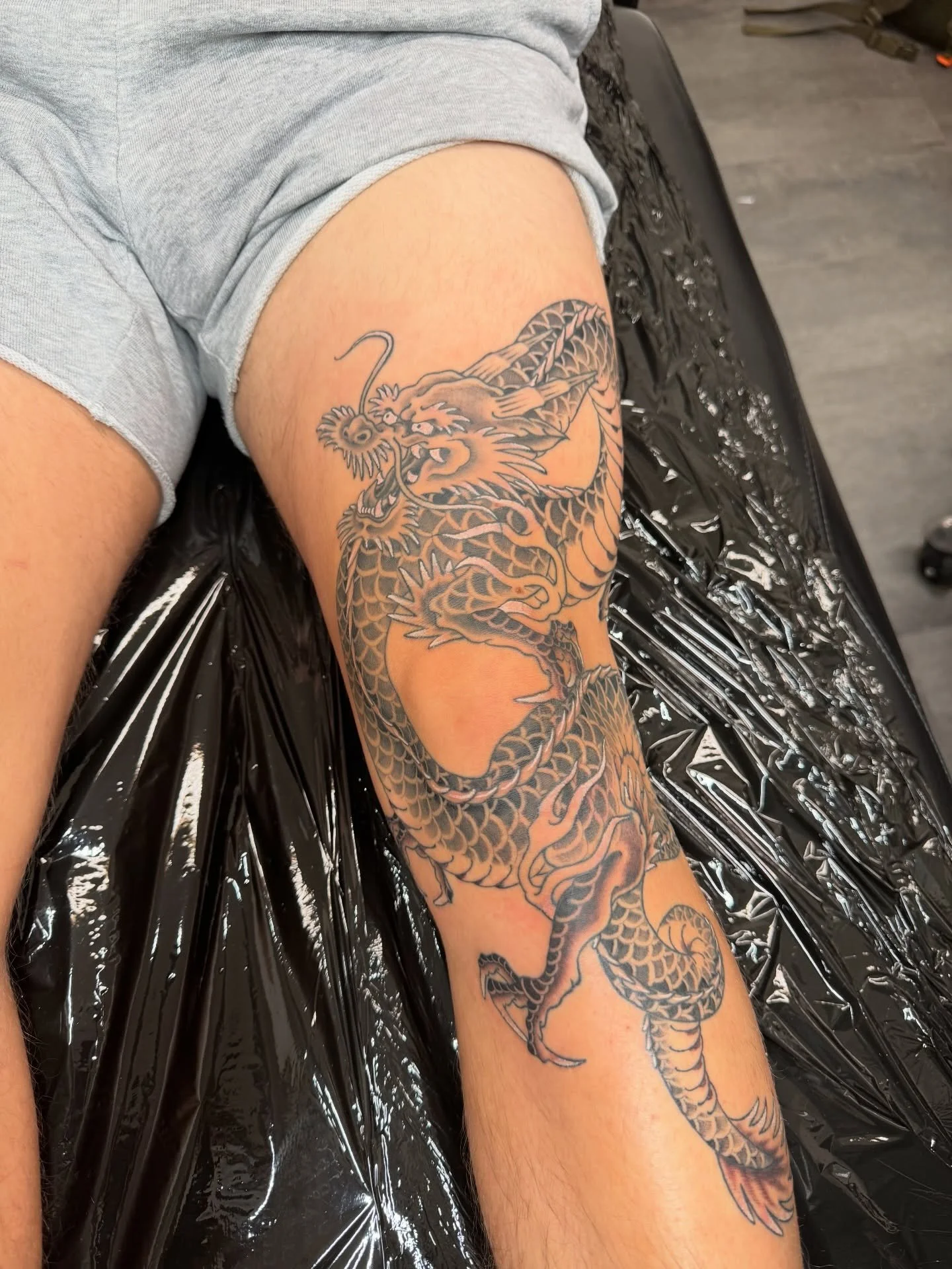 Enjoyed doing this Japanese dragon leg piece for Adam 🐉
Swipe to see healed pics➡️

For bookings and enquiries email me on louie@almostangels.co.uk 

Made at @aatattoofamily 
📍 10 Fore Hill, Ely, Cambs, CB7 4AF

Supported by @checkmatetattoocare