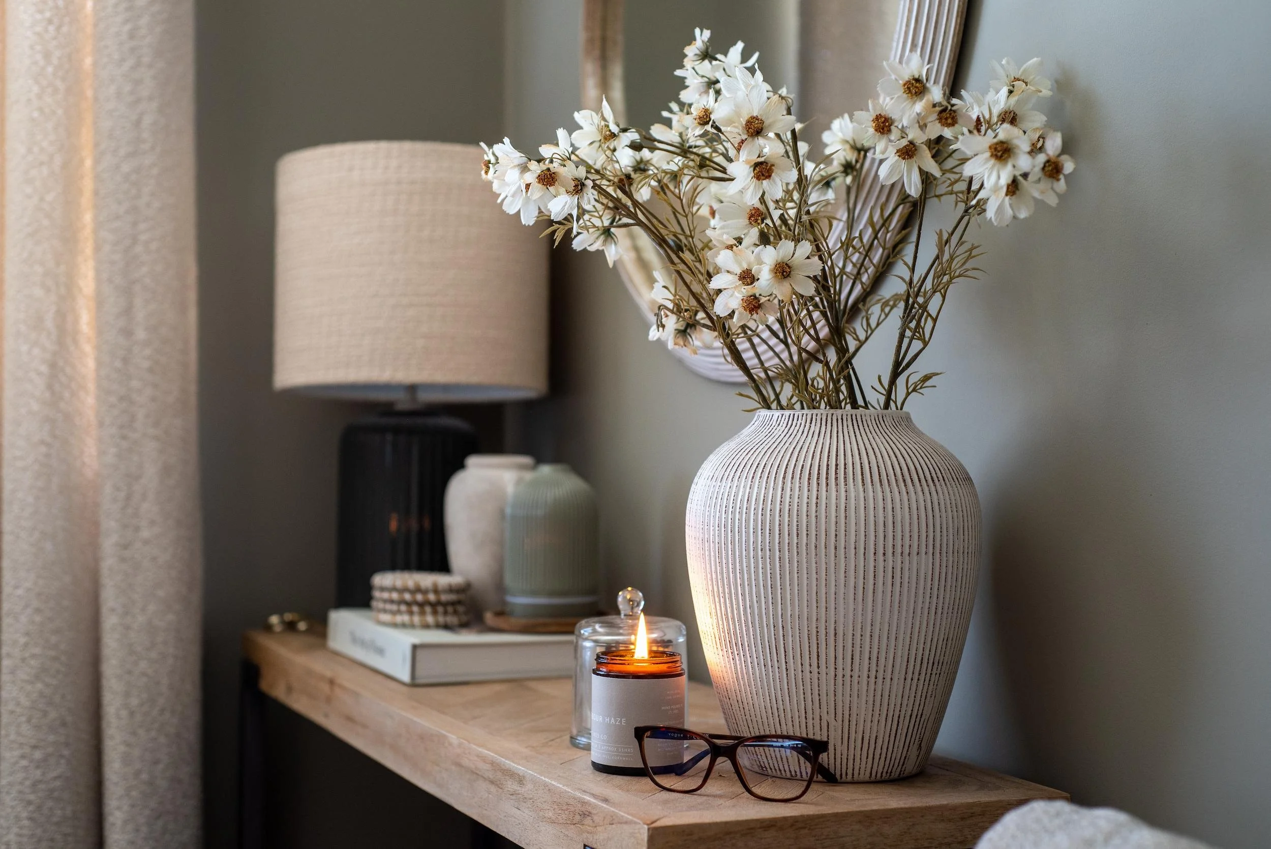 Rustic wooden console table styled with Table Lamp, Handmade Candle and Dried Foliage