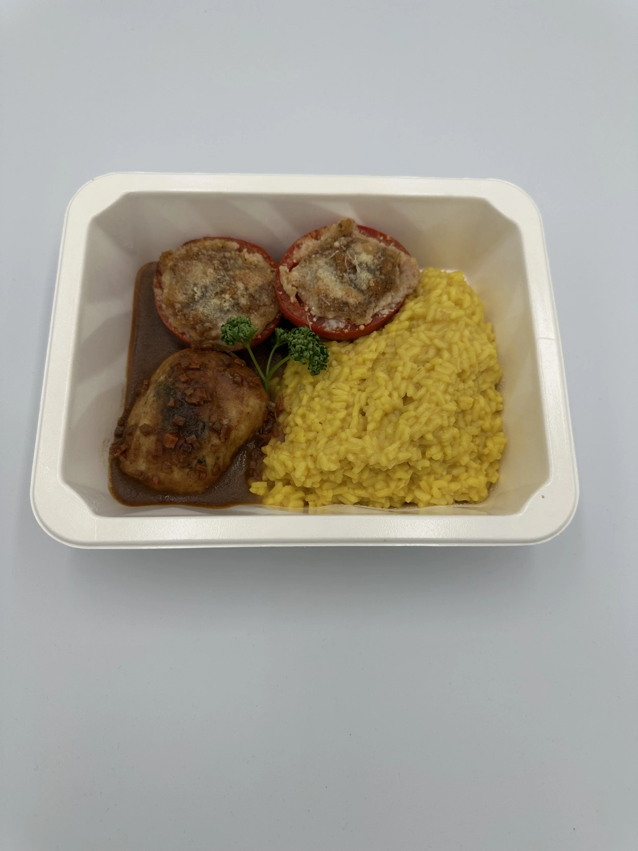 Kalbs Adrio mit Safranrisotto und Kräutertomate.jpg