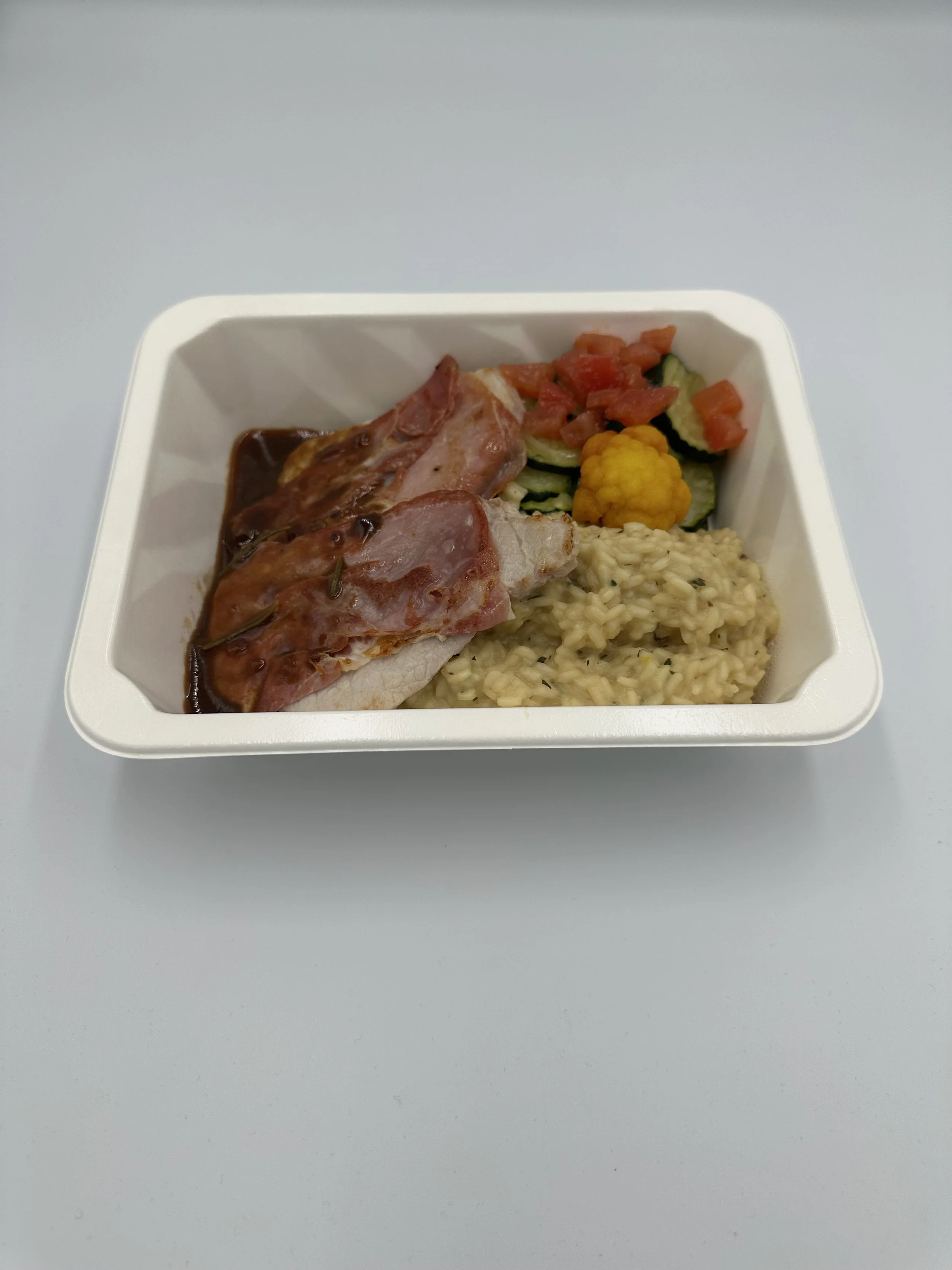 Saltimbocca mit Kräuterrisotto und Zucchetti.jpg
