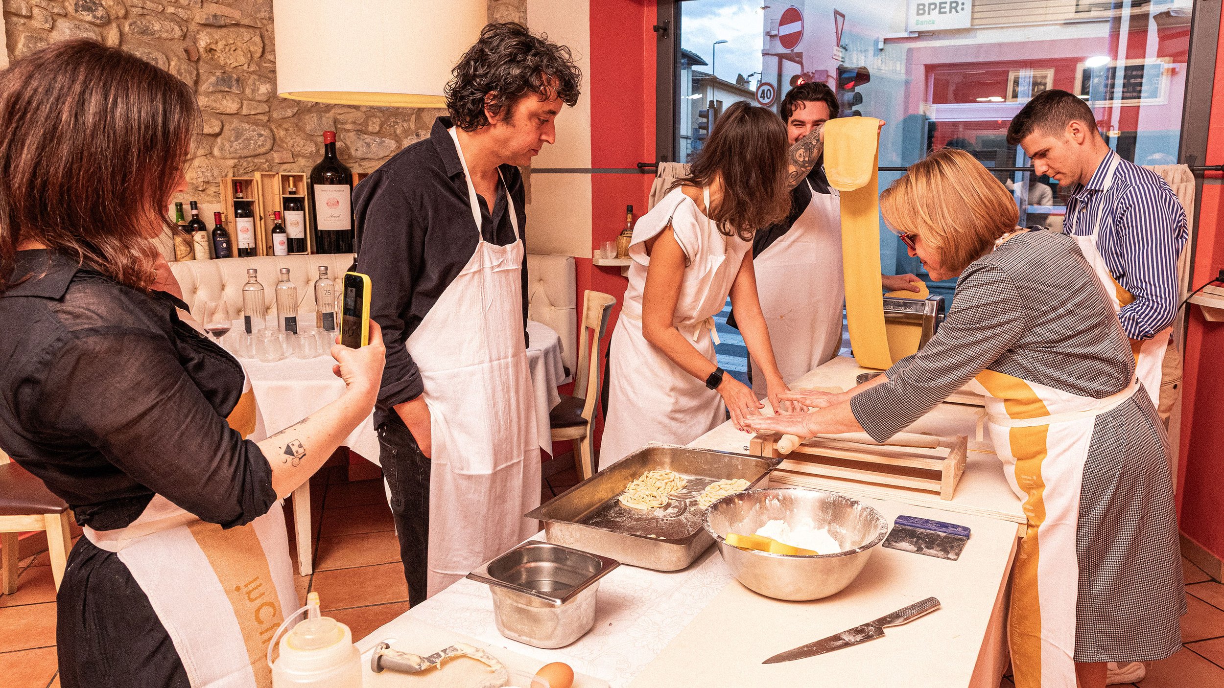Group of students making pasta.