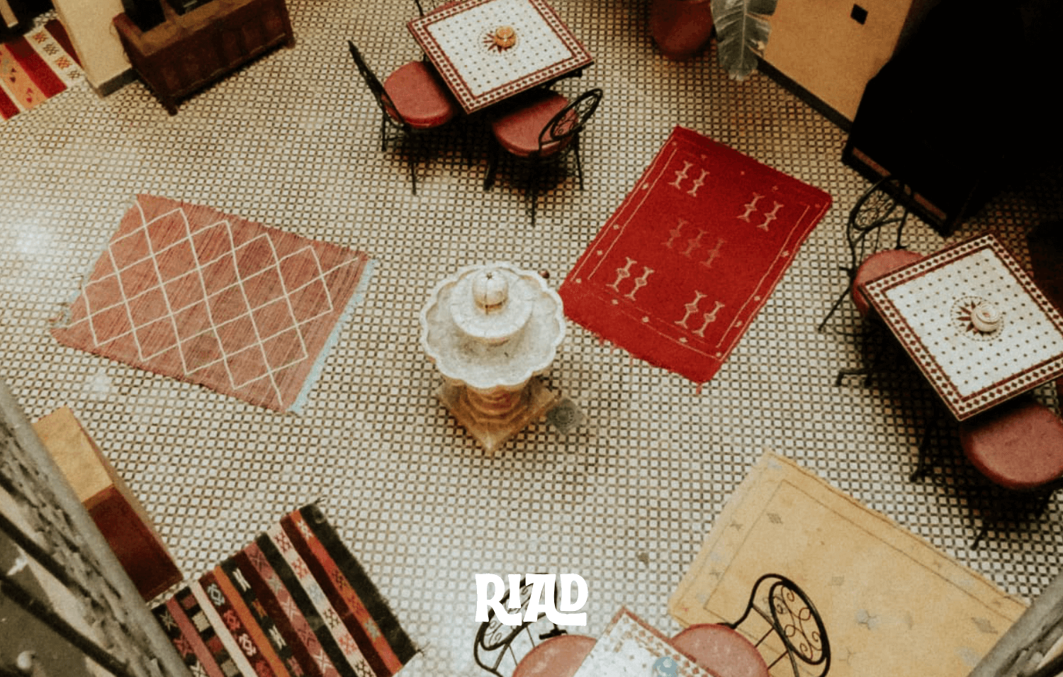 morocco riad loft with fountain and tables