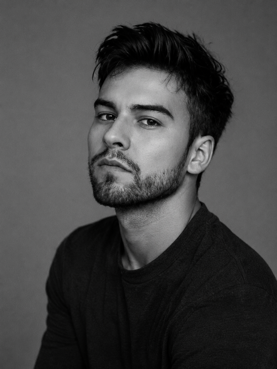Elegant, B&W, and recent professional headshot portrait of the "Made in America: or The Tragedy of Billy Castle..." (2025)  and "The Schultz Brothers" author and founder of boutique publishing house Abbycat Group & Pub. Brands, Jack Chase.