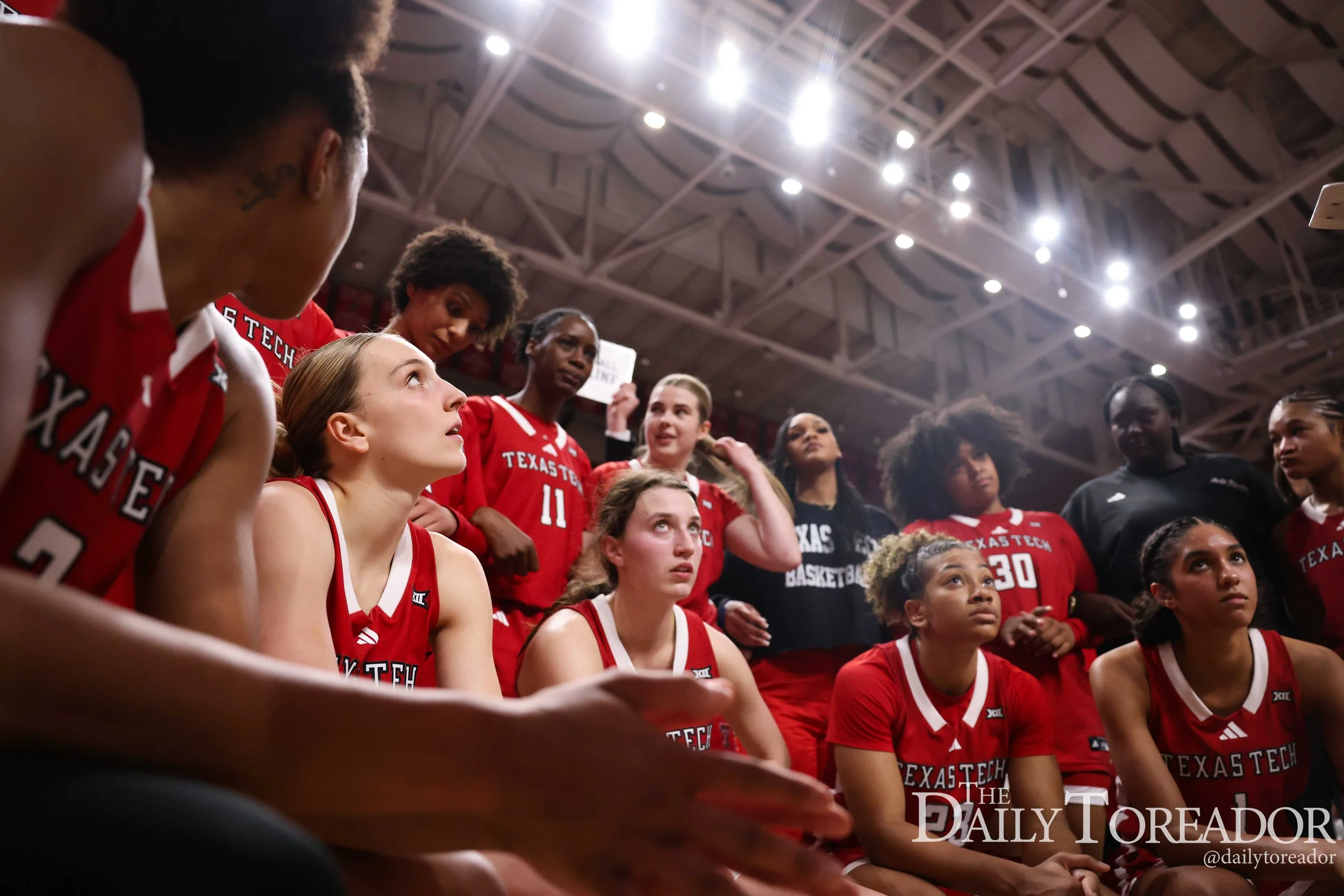 Texas Tech redshirt junior Dean Fritz looks to the ceiling of United Supermarkets Arena while in a timeout during Tech’s senior game matchup against Colorado at United Supermarkets Arena March 1, 2025.