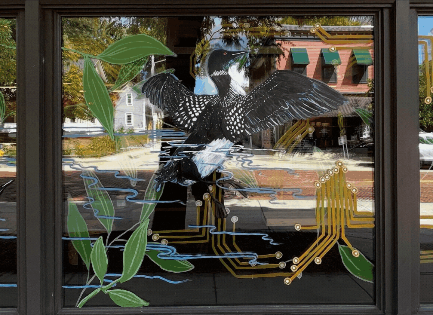 An animated image of three murals painted by Dania Grevengoed.