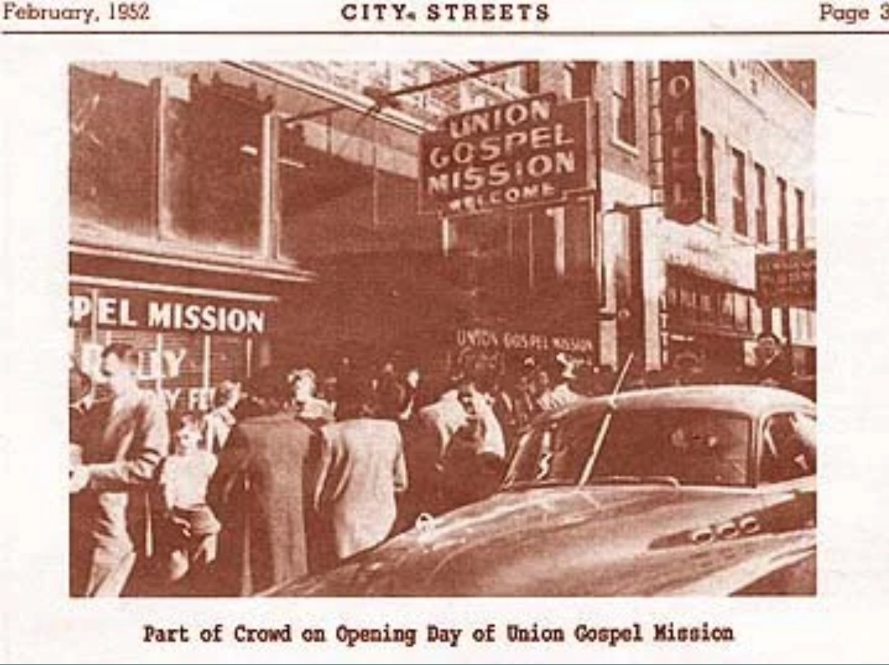 A black-and-white photograph of a busy city street scene from February 1952. The scene shows a crowd of people gathered outside a building with signs that read 'Union Gospel Mission' and other text. There are vintage cars parked on the street and pedestrians walking or standing around. The background features more buildings with signage, indicating a lively urban environment.