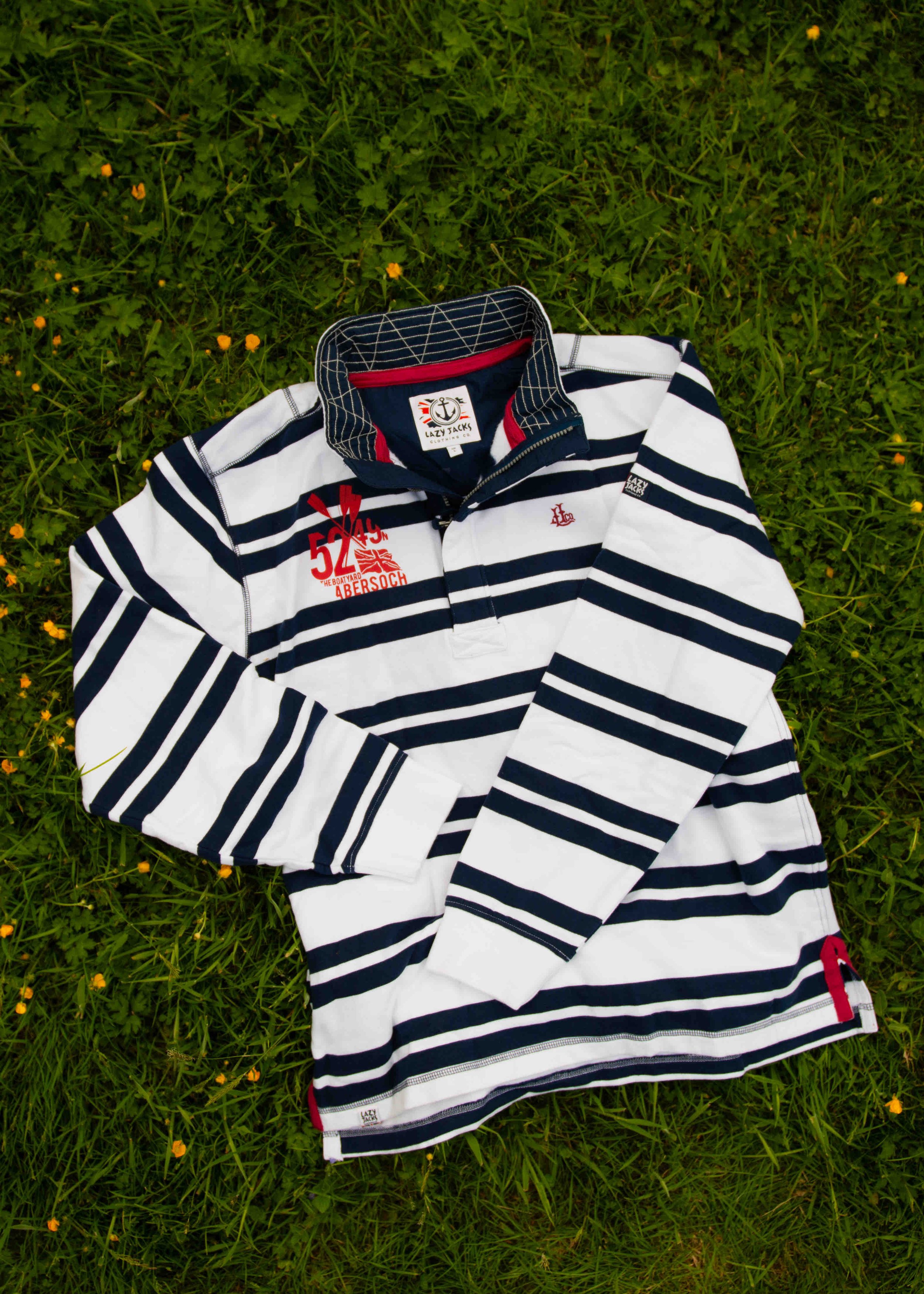 Striped rugby shirt on grass