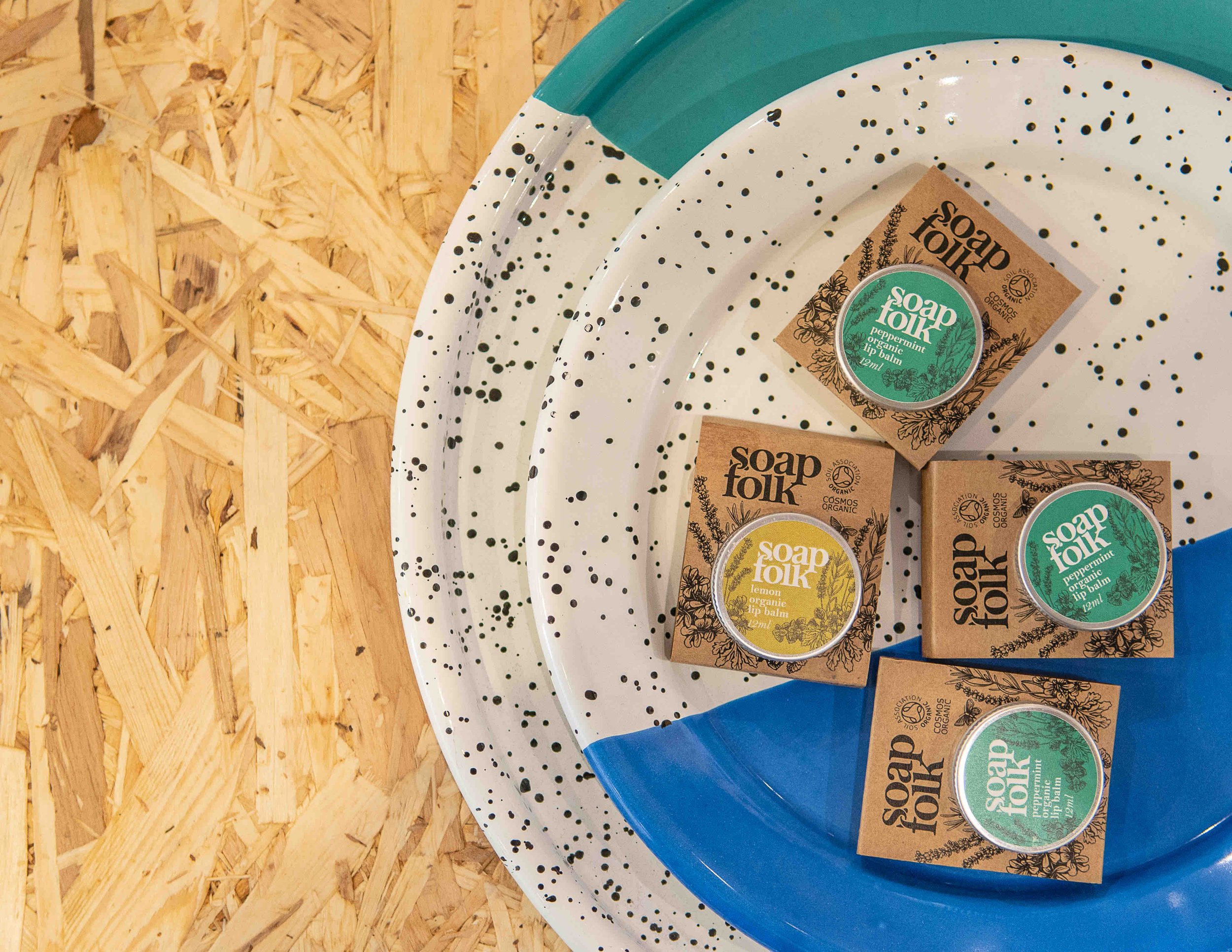 Soap Folk organic lip balms on speckled plates