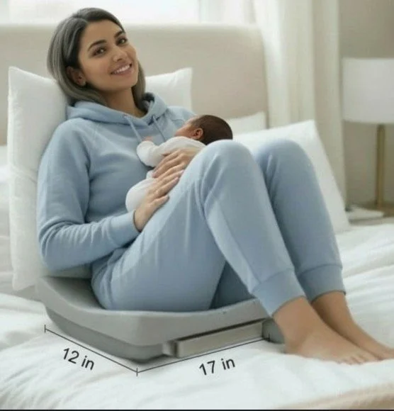 new mom holding an infant.jpg