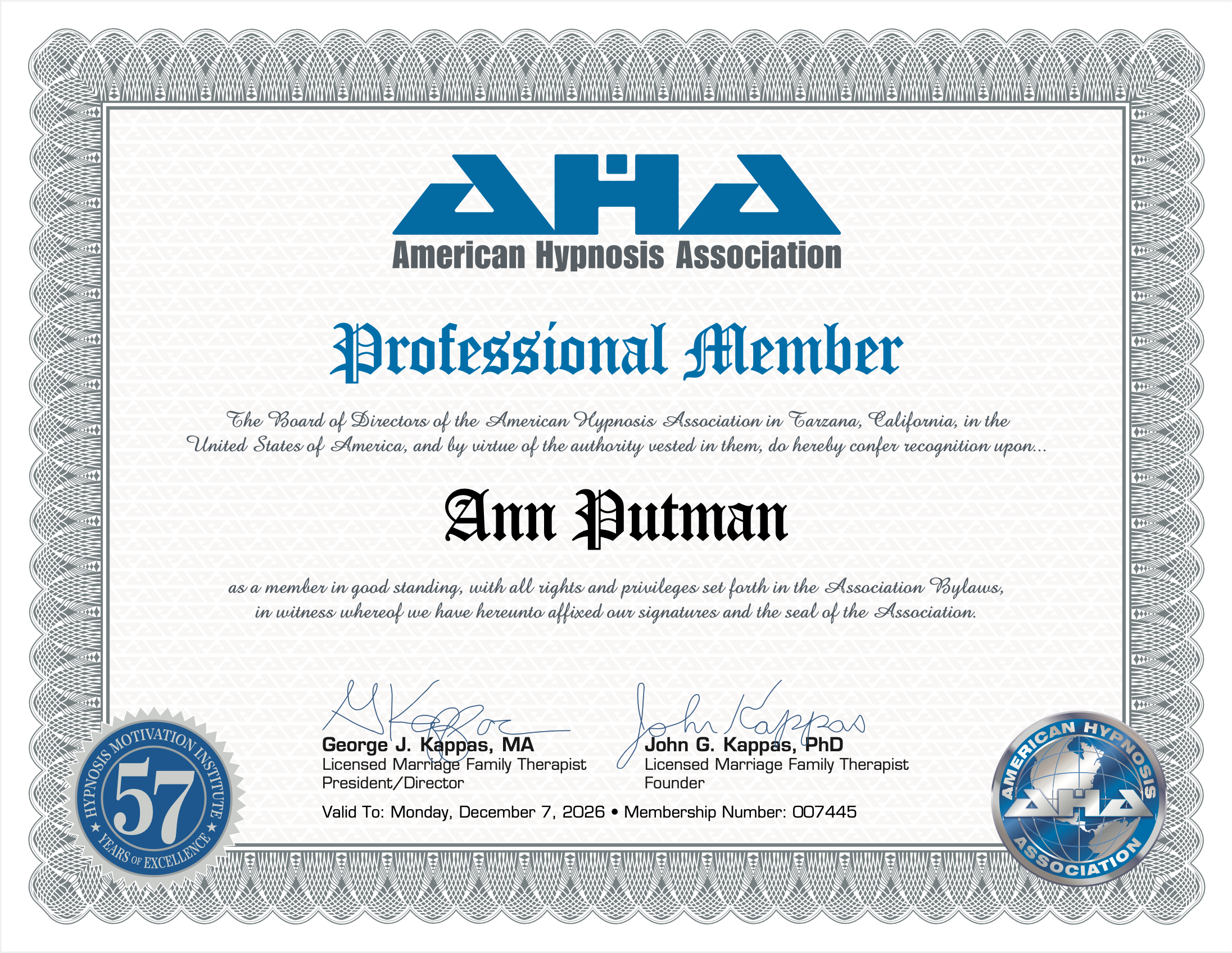 A certificate from the American Hypnosis Association awarded to Ann Putnam, signifying professional membership. It features the AH A logo at the top, signatures, and a seal at the bottom corners, with a decorative border.