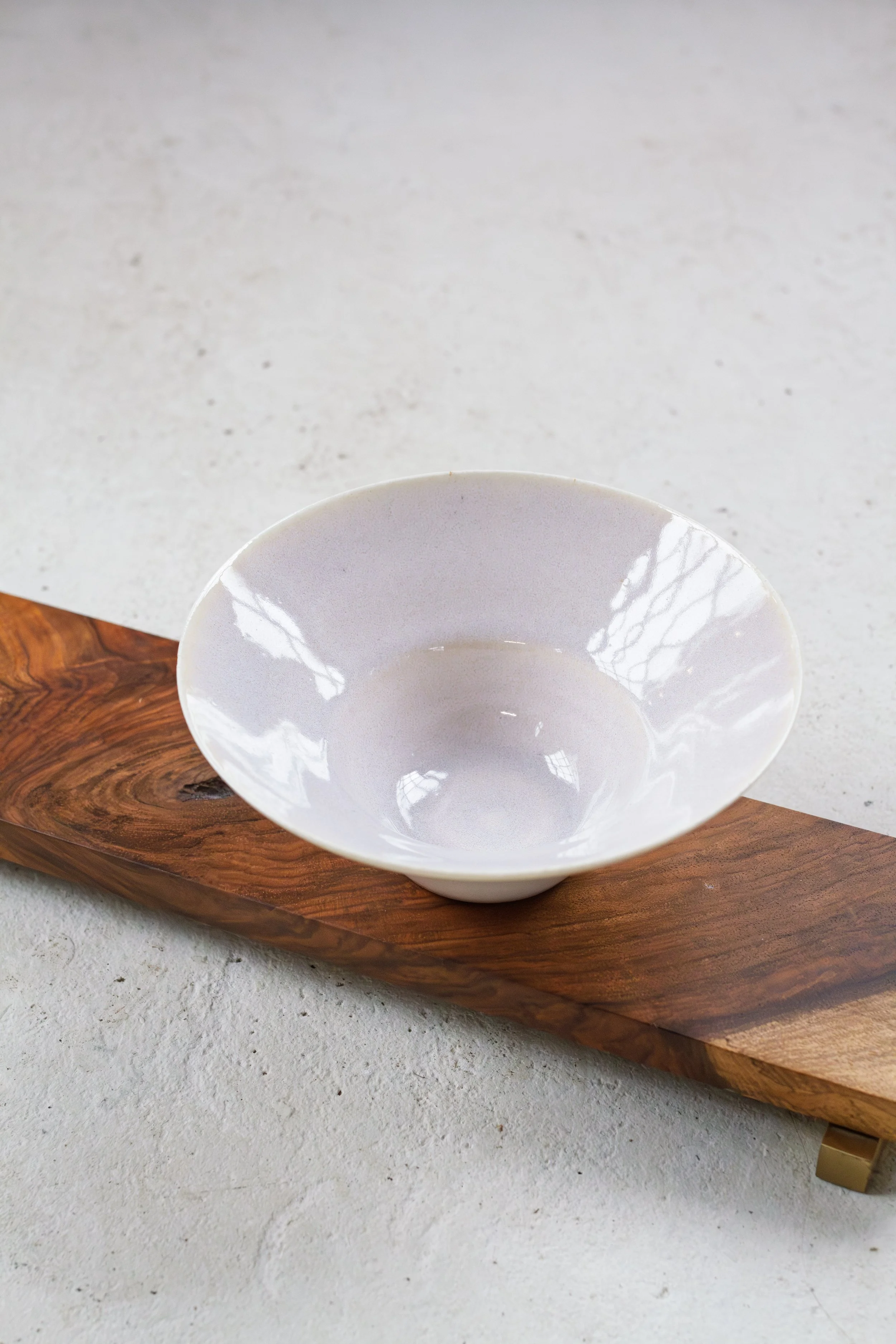 handmade porcelain rimmed bowl pasta dish in lilac purple glaze made in stockport, manchester