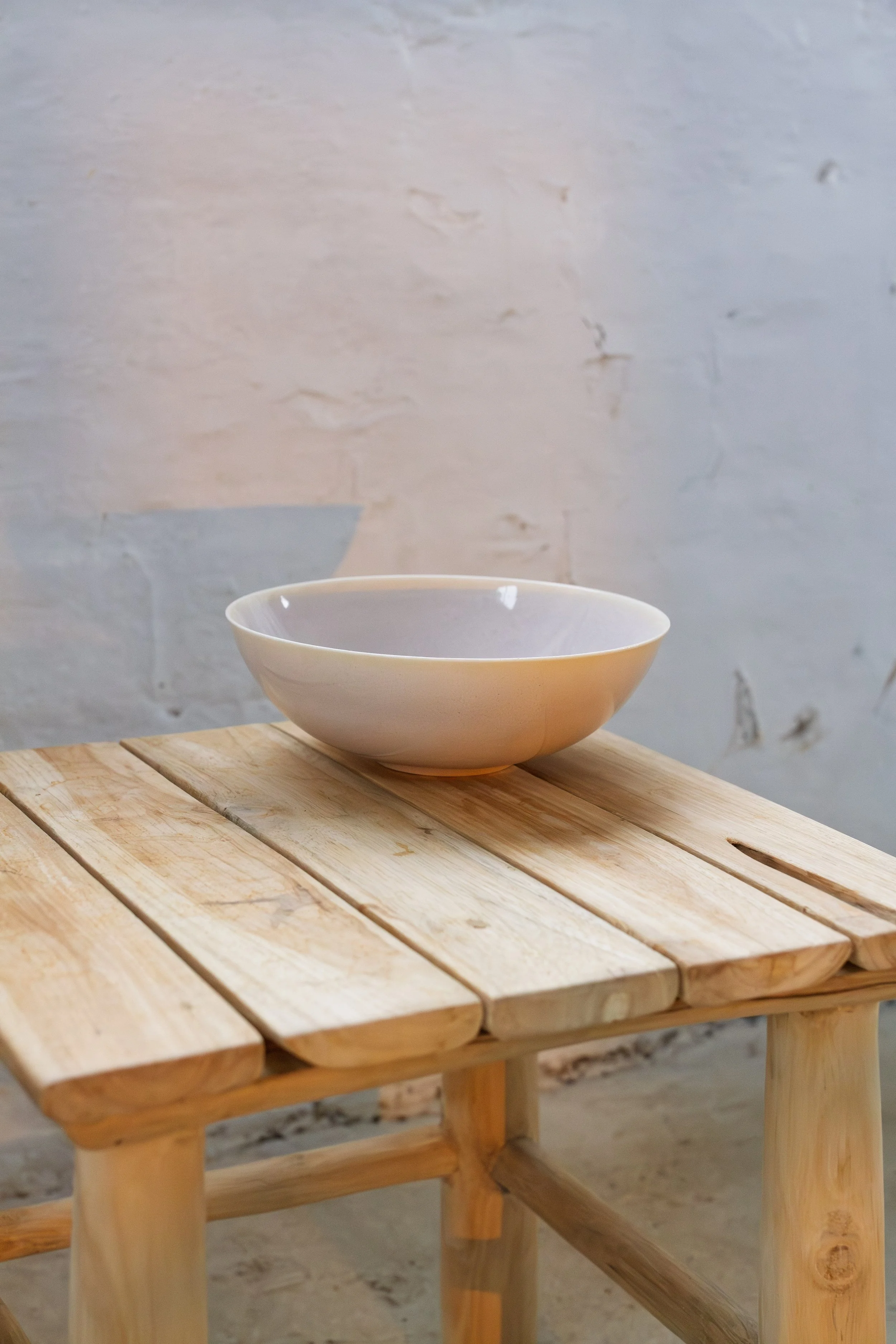 handmade porcelain wide low bowl in pastel lilac glaze made in stockport, manchester