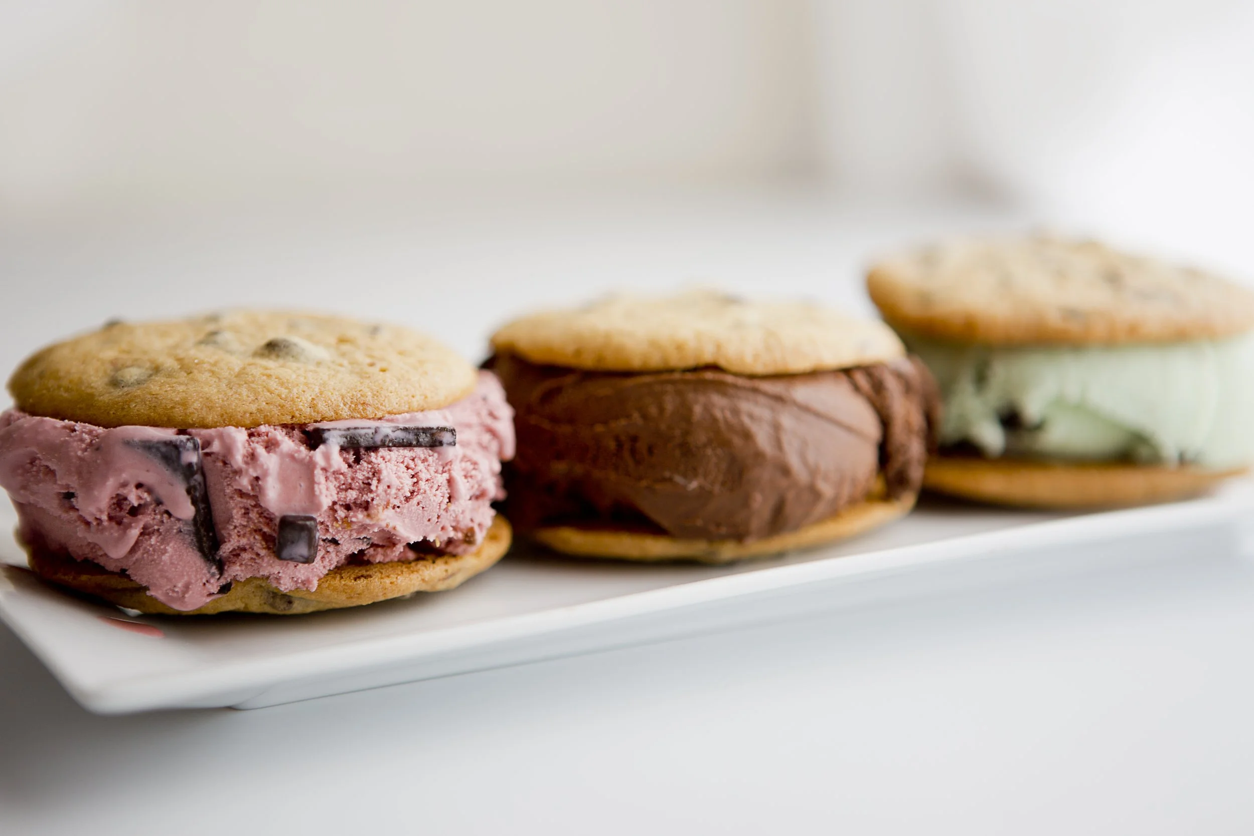 chocolate chip cookie ice cream sandwiches with black raspberry chip chocolate ice cream and mint chocolate chip
