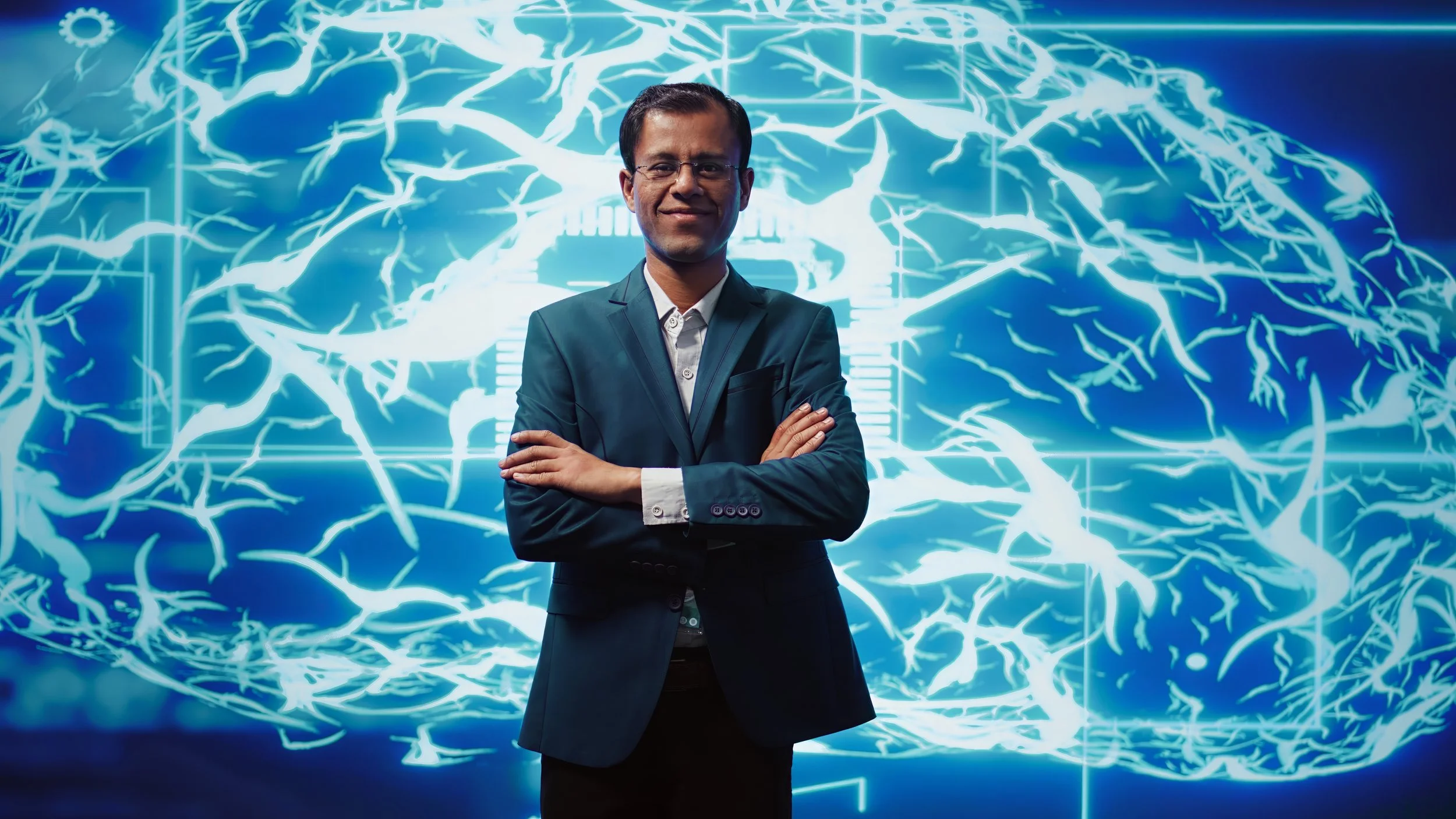 portrait-happy-man-standing-with-arms-crossed-front-ai-brain.jpg