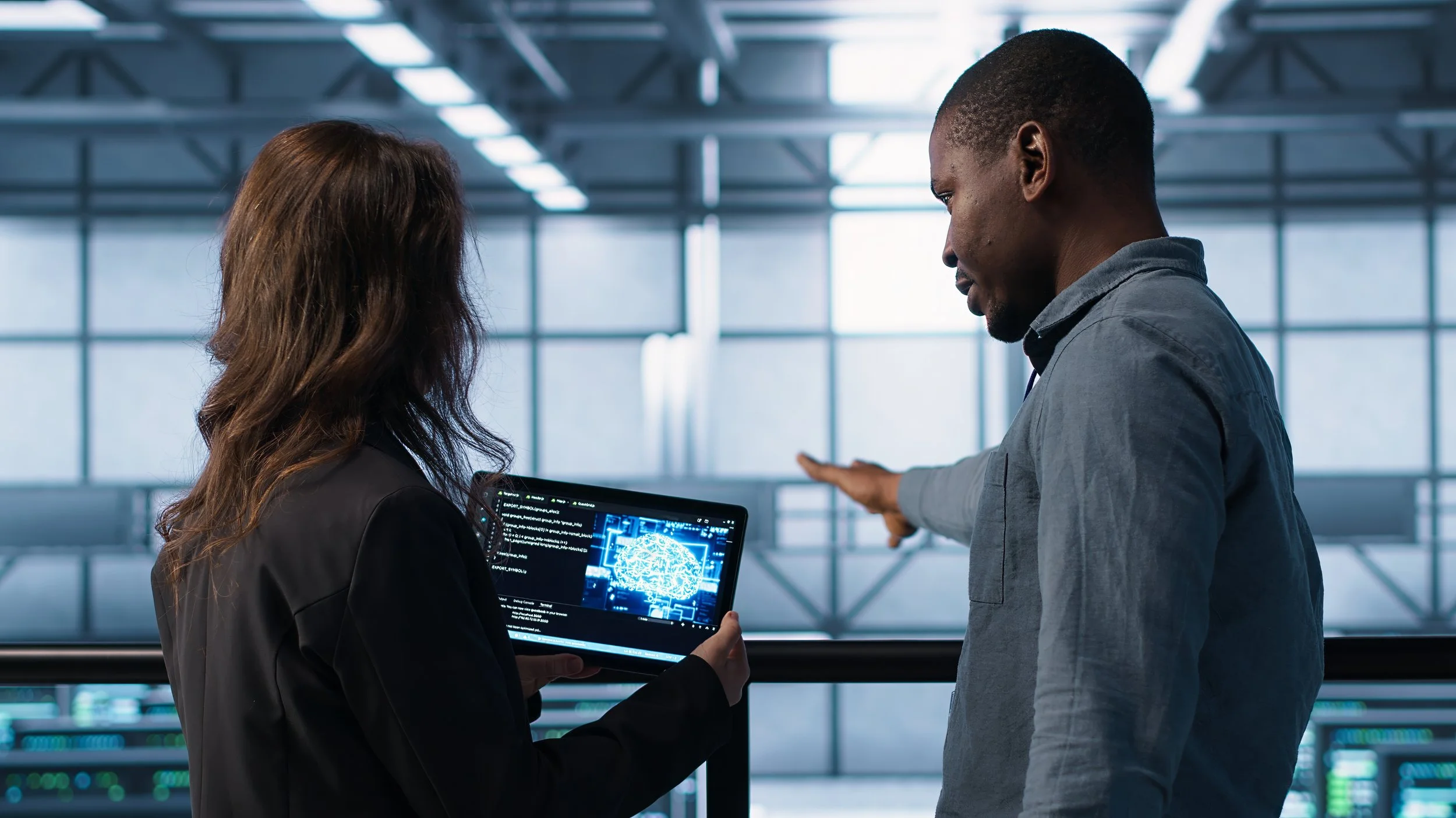 data-center-technicians-deploying-ai-driven-management-tools-using-tablet.jpg