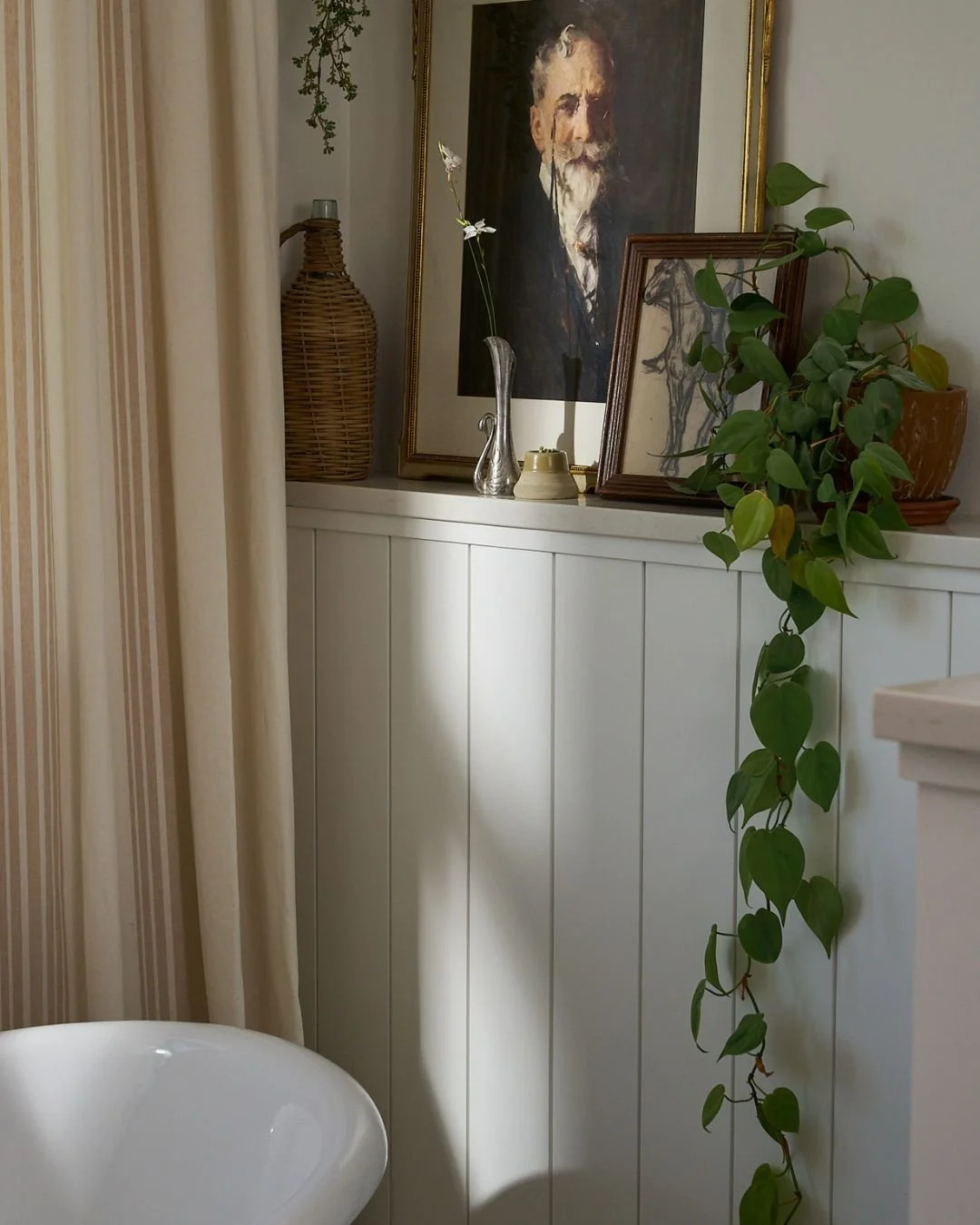 Bright primary bathroom with organic textures, and vintage design details — photographed by Legacie Studios for interior designers and builders
