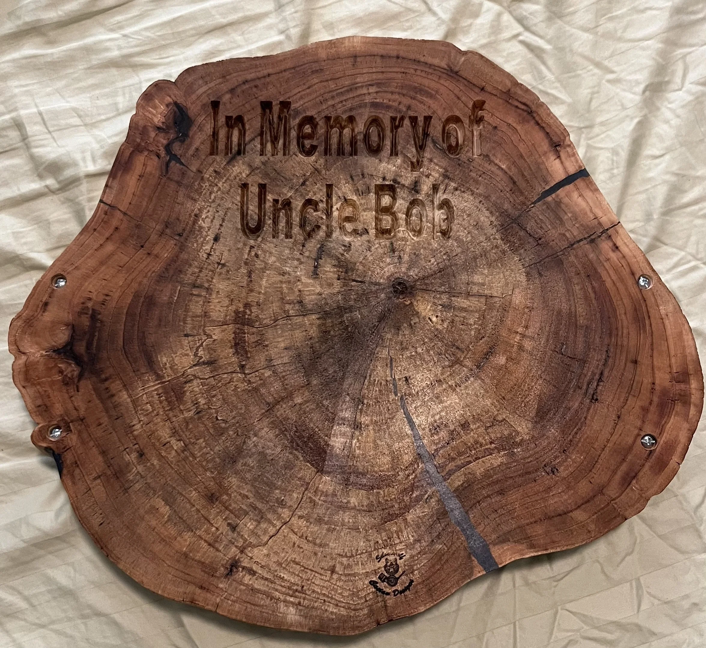 Engraving on back of live-edged charcuterie board