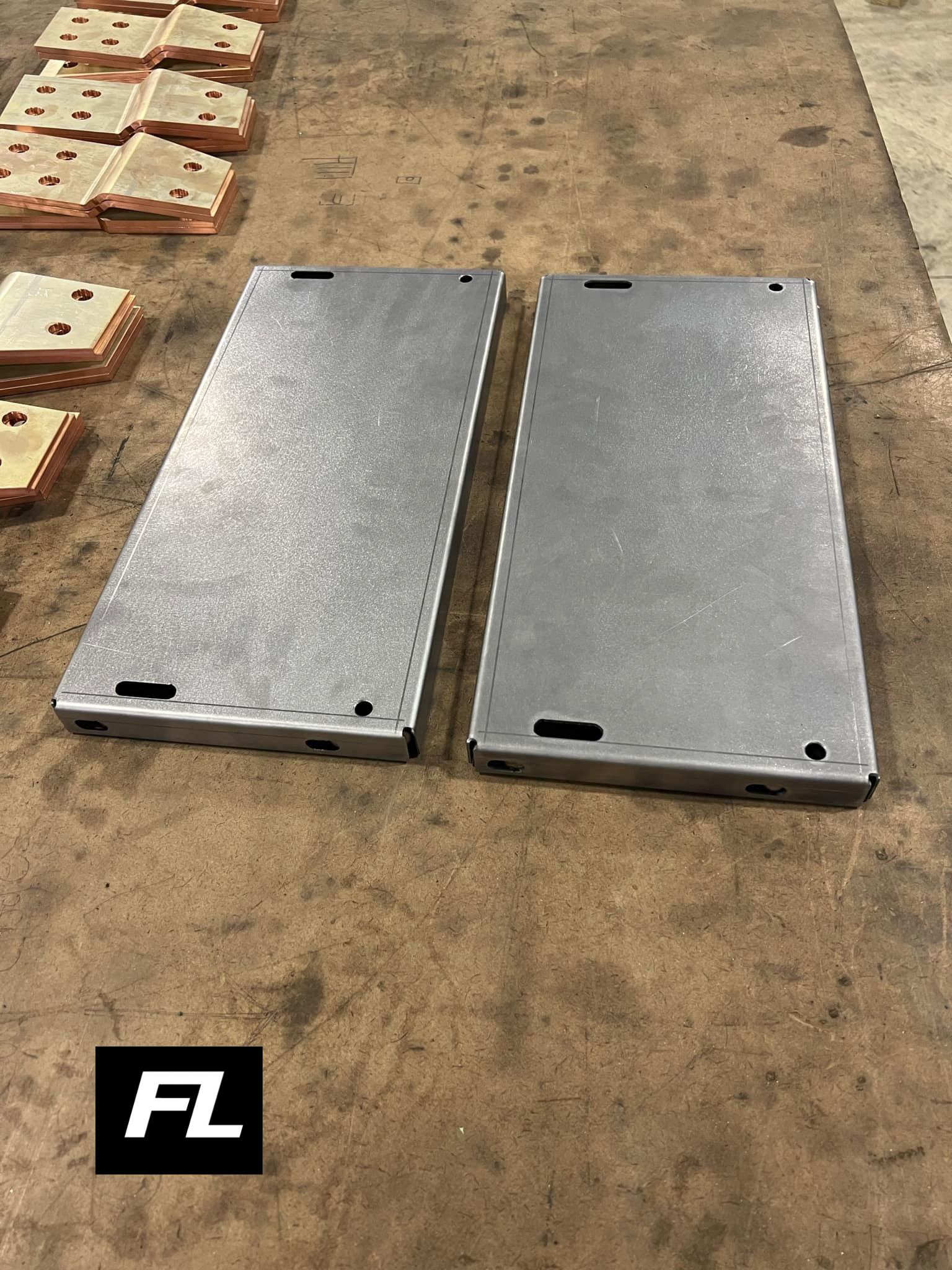 Laser-cut and formed cover panels with precision hole patterns for OEM applications.