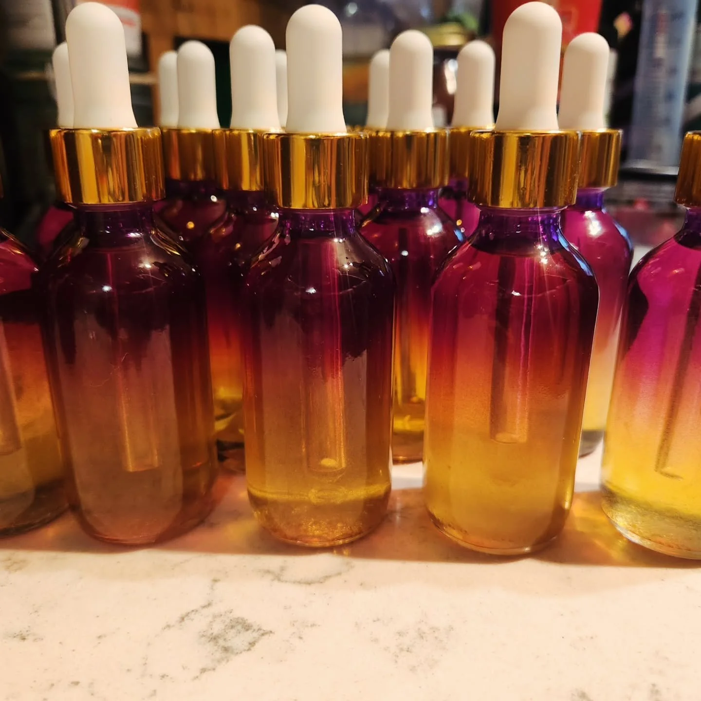 Made a new body oil today! This combines sweet almond oil with lilac blossoms and essential oils of lilac, honeysuckle, and elderflower, and wisteria fragrance oil (no harmful chemicals) and I'm going to call it Spring Enchantment!
Packaged in some b