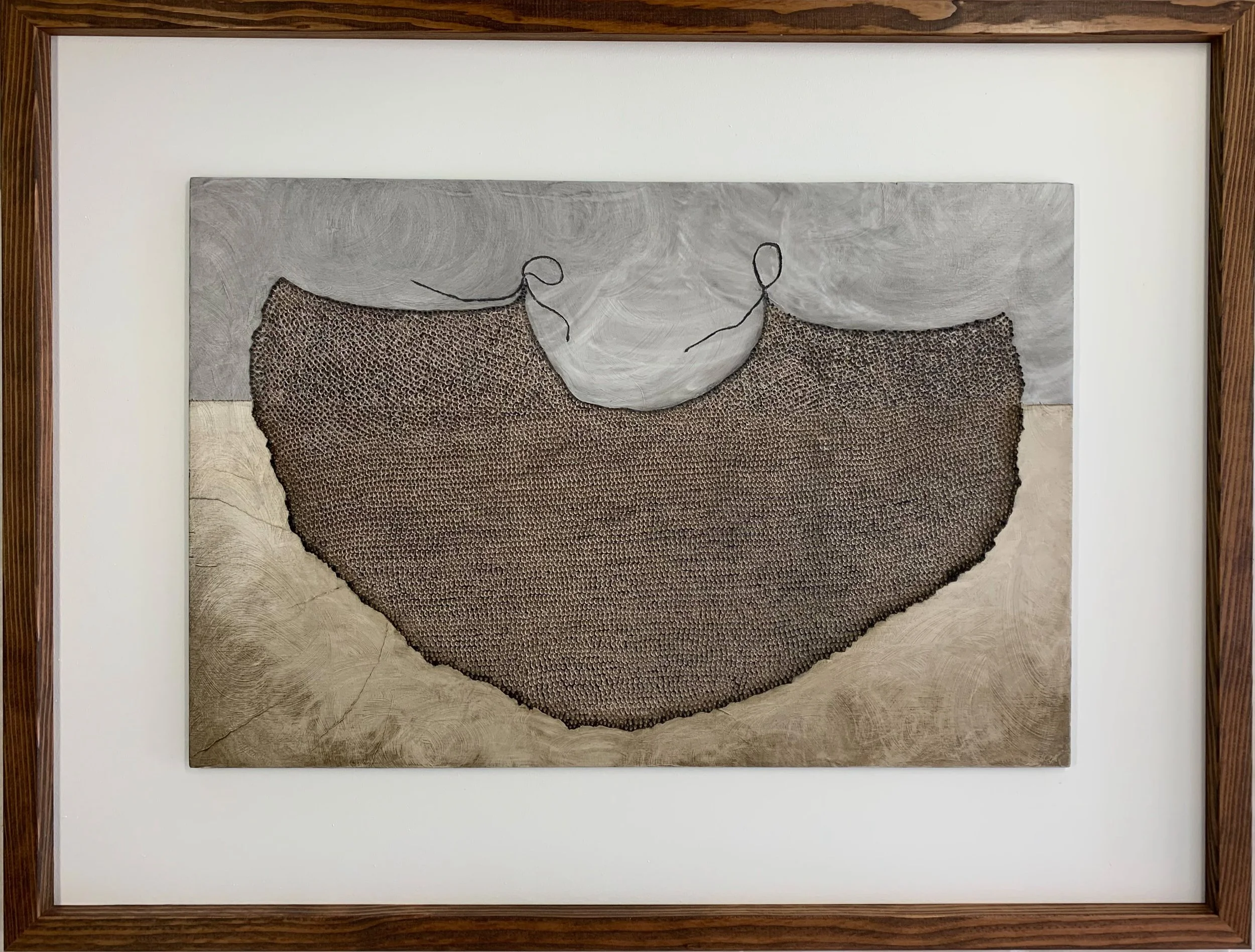 A hand-crafted and culturally significant Hawaiian shoulder cape framed in an artist-stained wood frame.