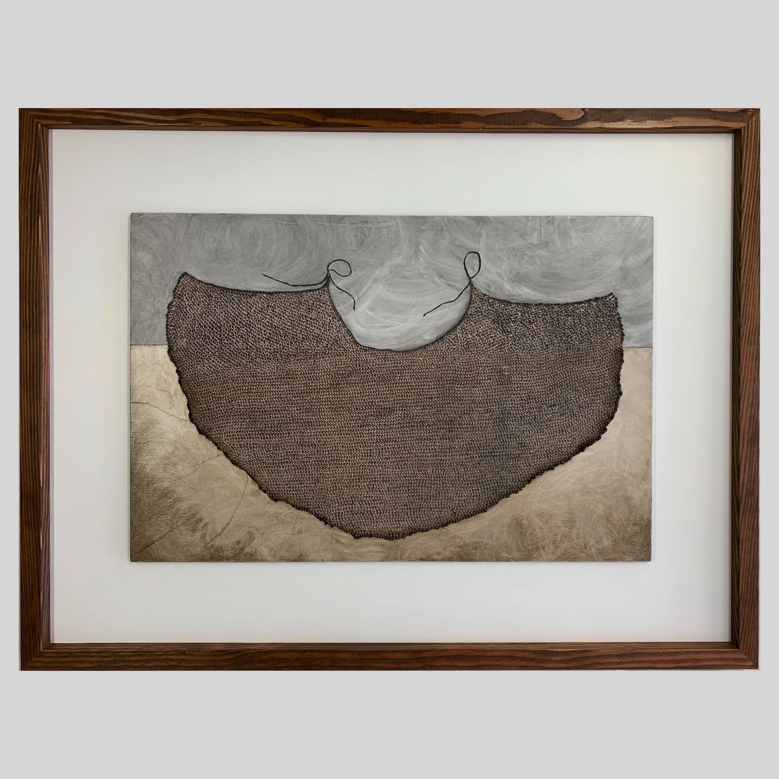 A hand-crafted and culturally significant Hawaiian textile framed in an artist-stained wood frame. 