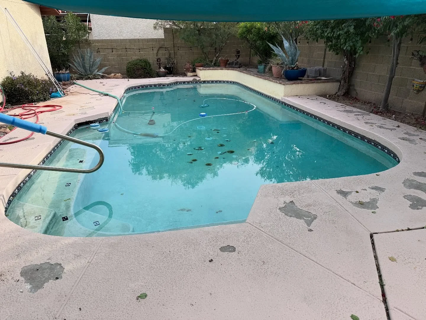 This is the unfortunate reality of putting off your pool resurfacing.

What starts as small areas of flaking plaster or minor cracks can turn into much bigger problems over time. When old plaster begins to fail, it allows water to penetrate into the 