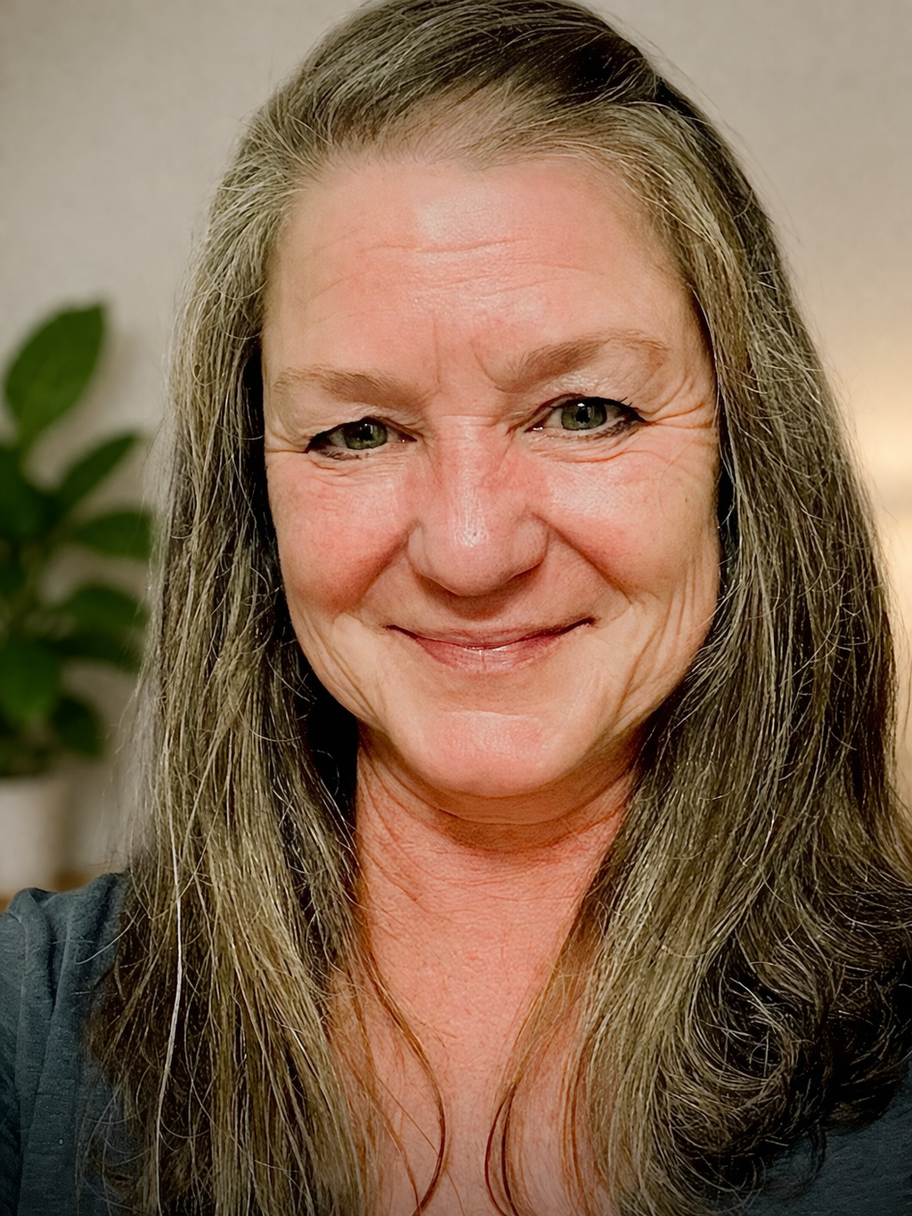 Tonya Jimenez, smiling, headshot.