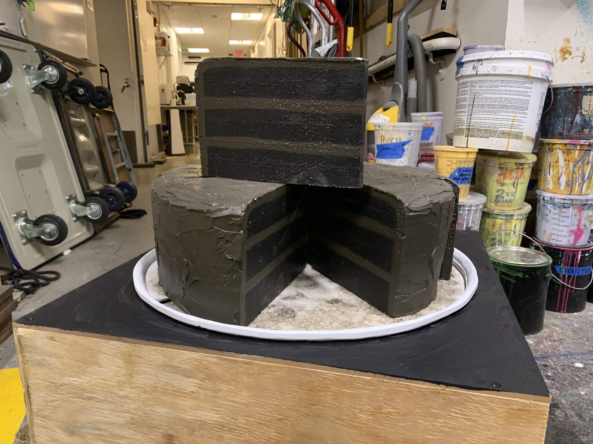 A large chocolate cake made for a production of Matilda (Imagination Stage JDS Camp).