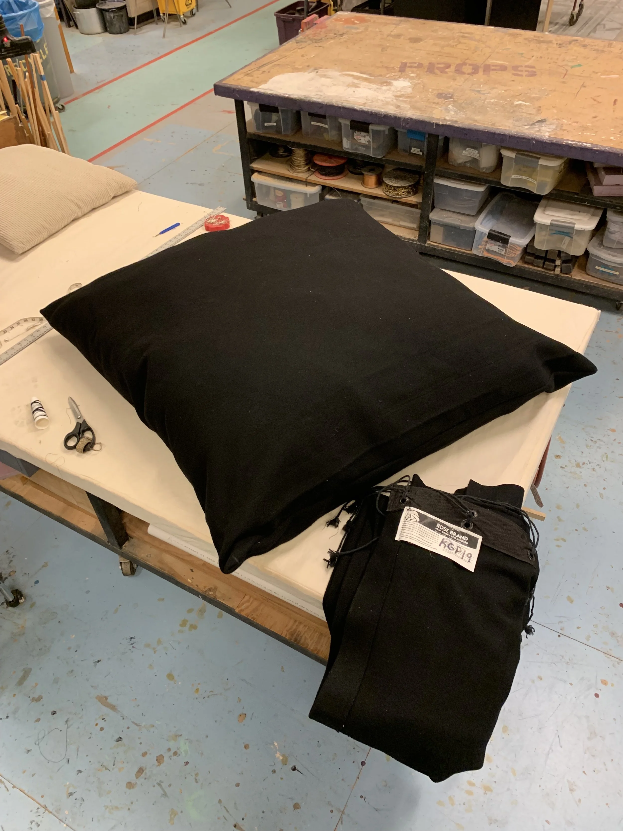 Pillow cases made to cover existing pillows. These pillows were used as audience seating in a dance performance (University of Maryland)