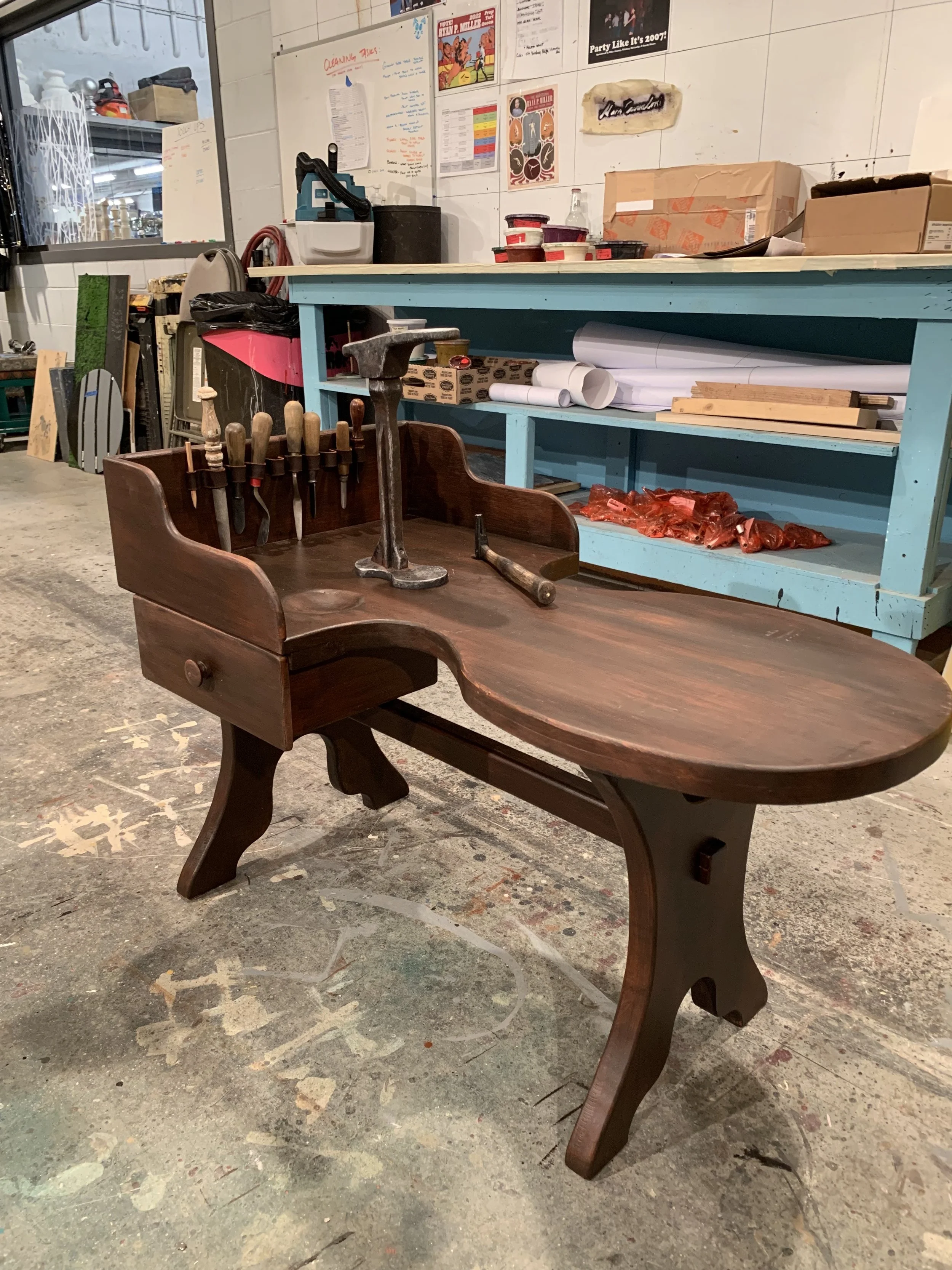 A cobbler's bench built for a scene from Die Meistersinger von Nürnberg (The Santa Fe Opera). Painted by artisan Lauren Eckard.