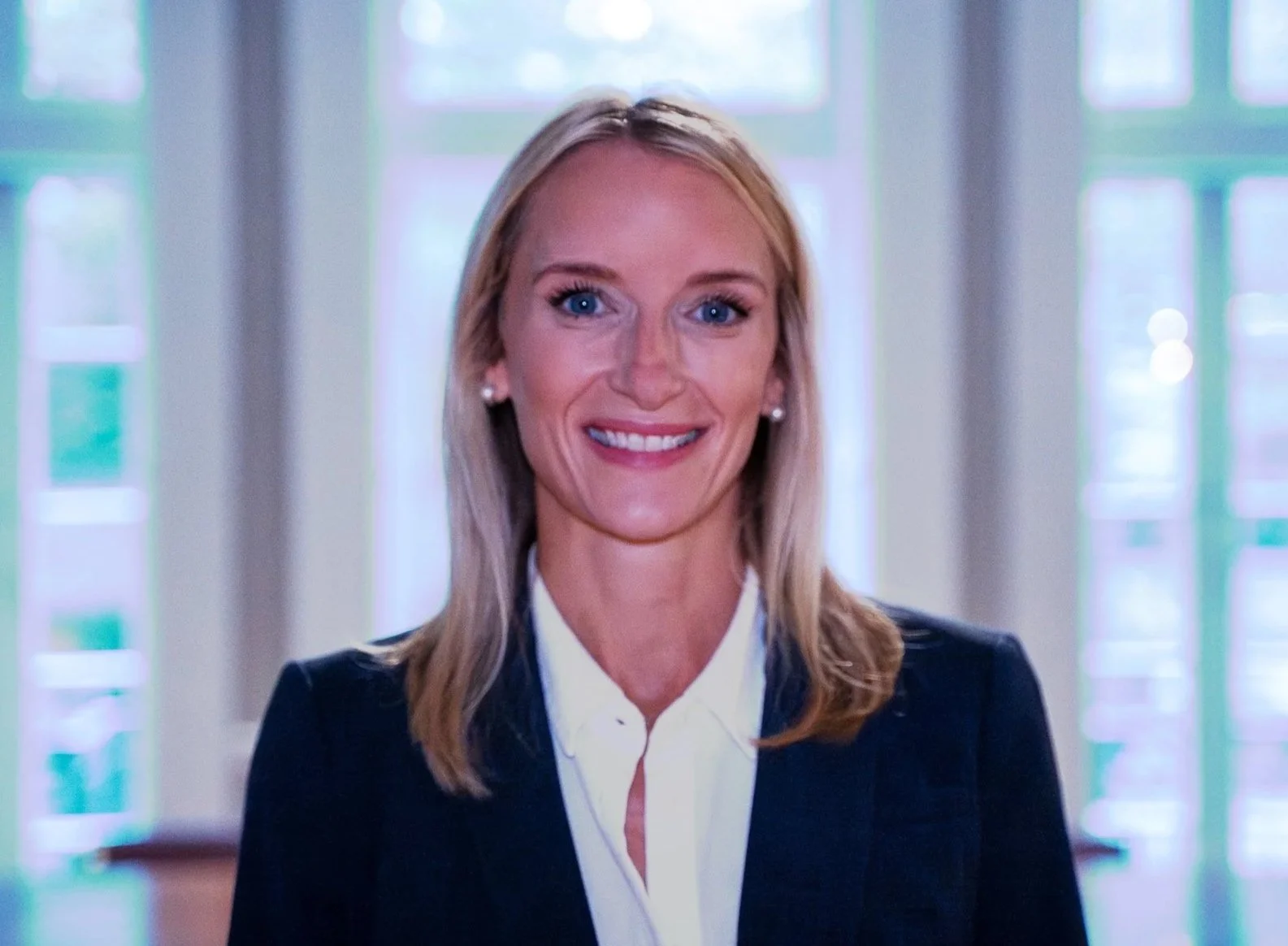 Katie E. Torjusen Partner, Chief Compliance Officer