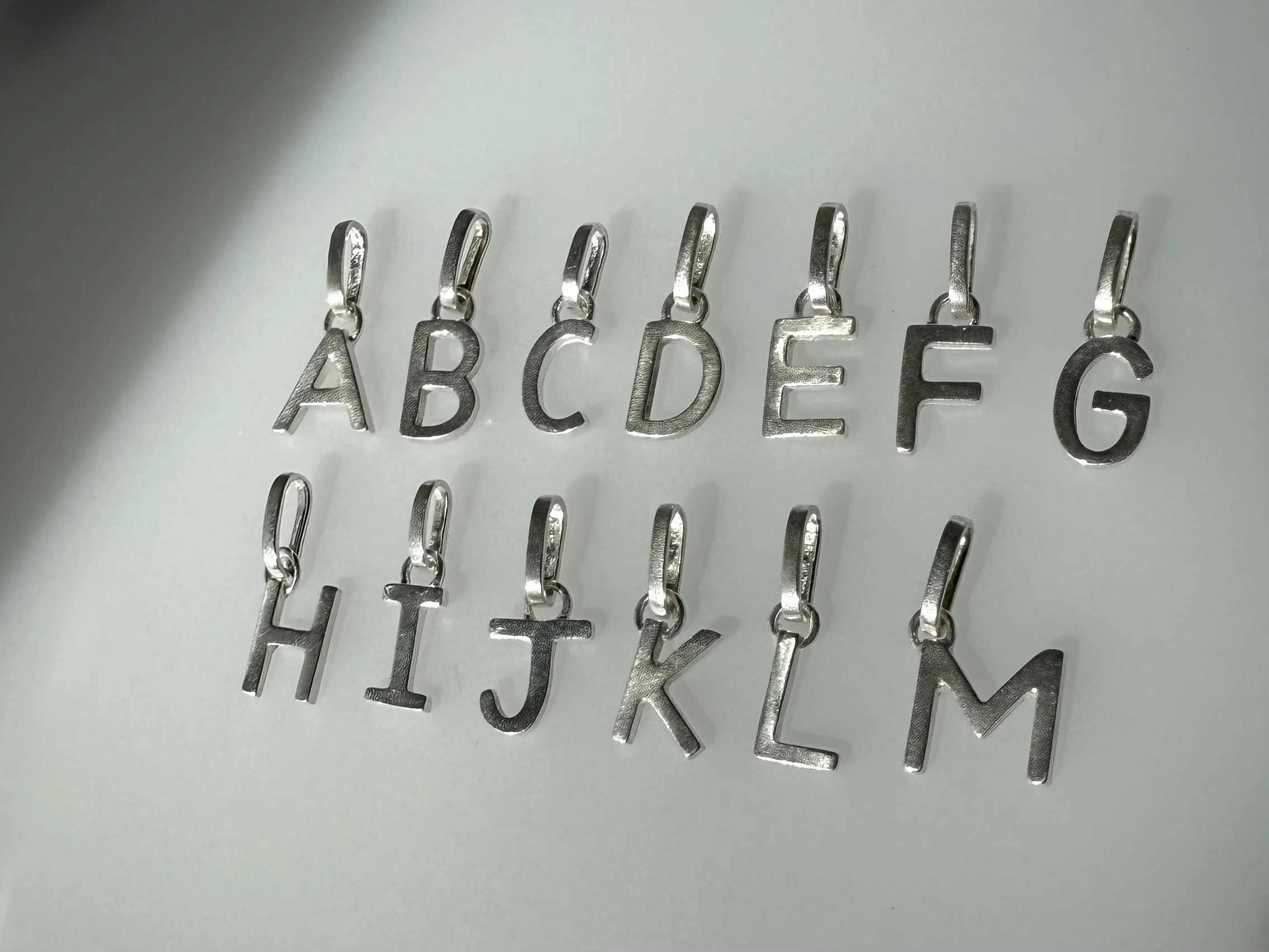 Letter Pendant_A-M_angle.jpg